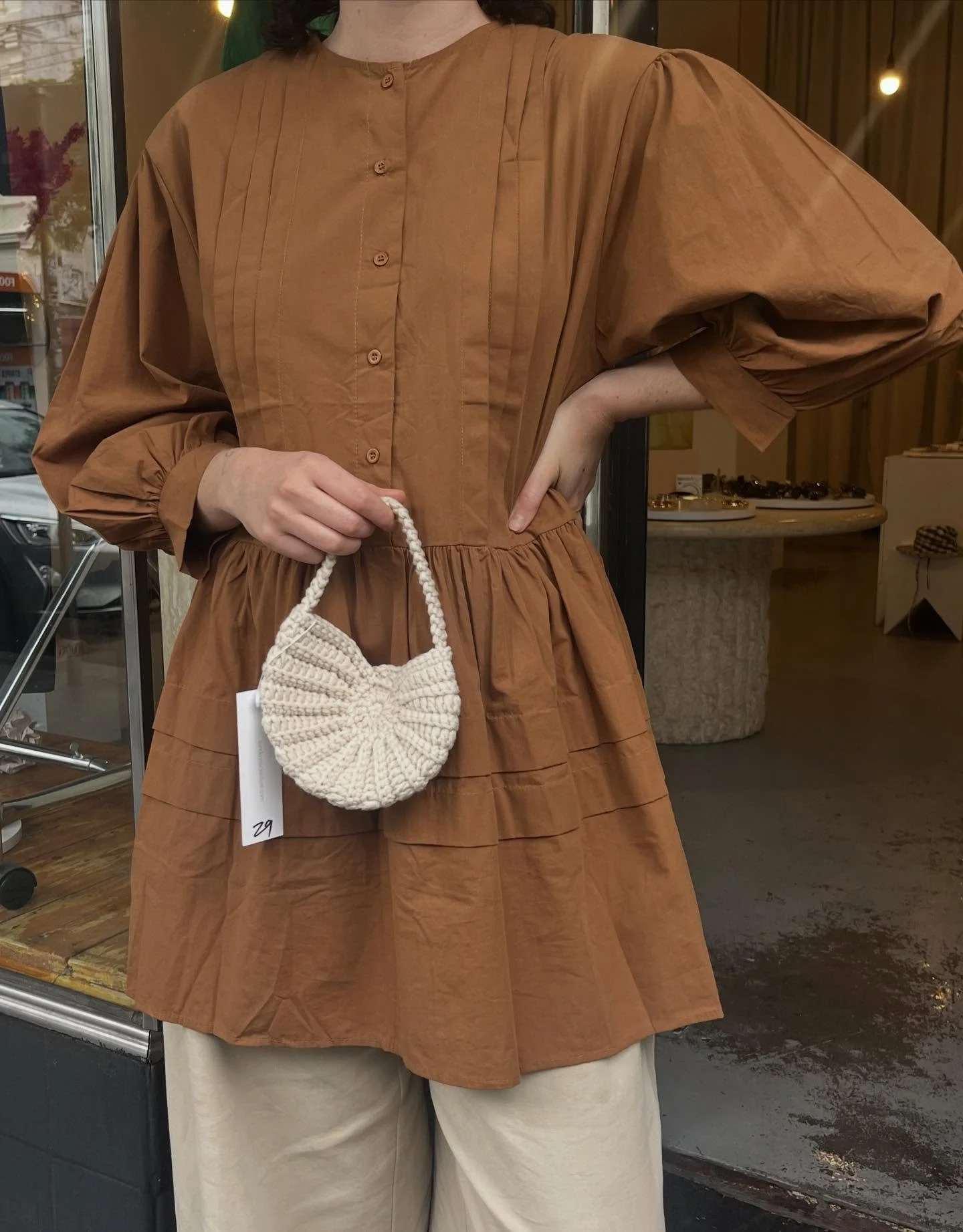 It&rsquo;s dress over pants weather 🌂 
conch bag $29, dress $89 🫐