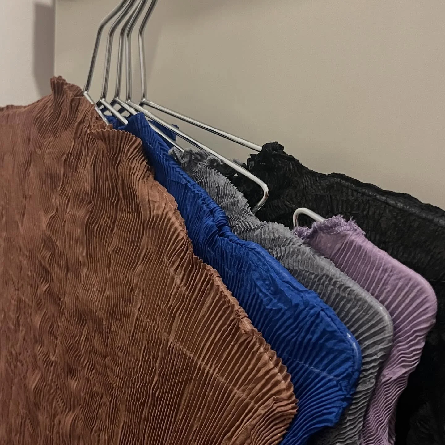 Pleated tops galore! The perfect present for your coolest friend and only $89💜💙🤎🩶🖤