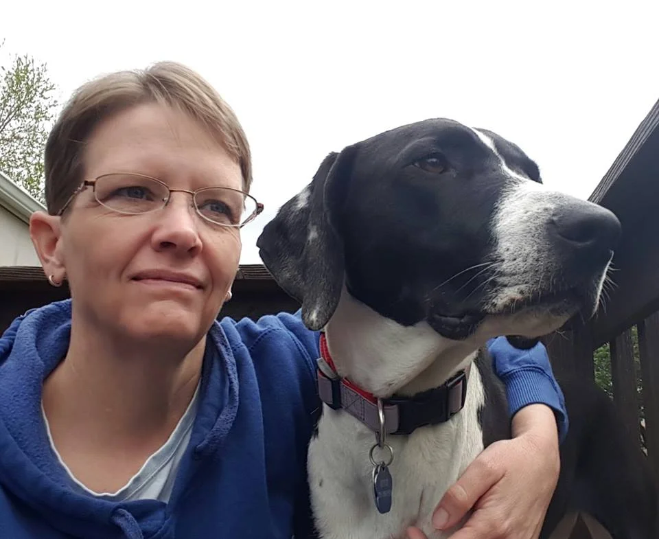 Elizabeth with her dog, Minnie.