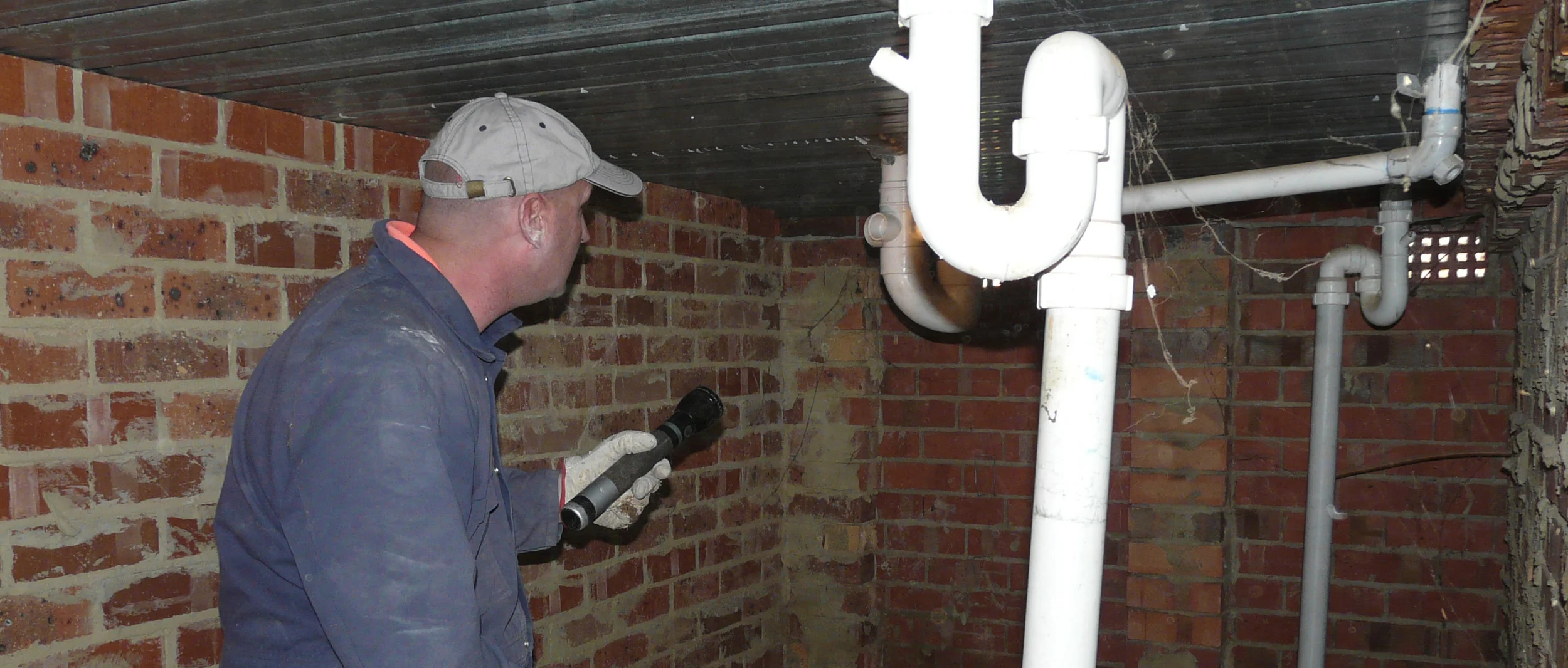 Mick in sub-floor banner.jpg