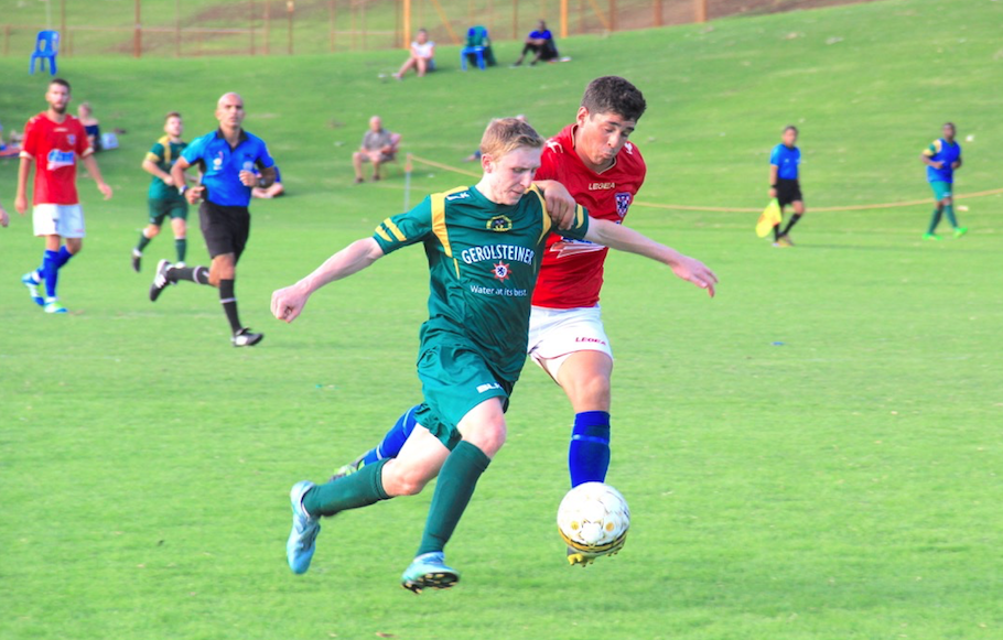 UWA forward Alex Kretowicz surges forward. 