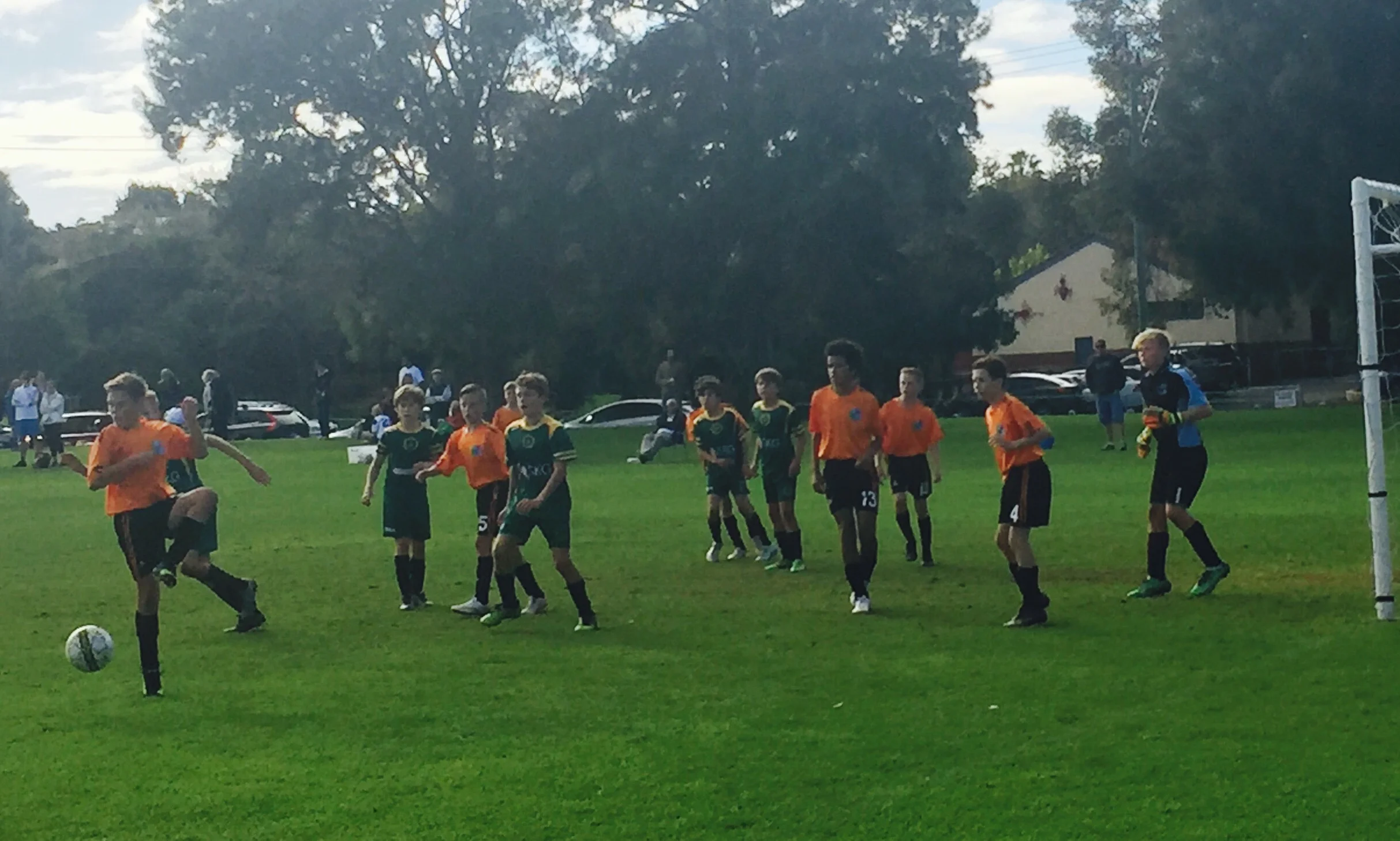The 13s Boys Division 1 side in action against Warnbro Strikers SC