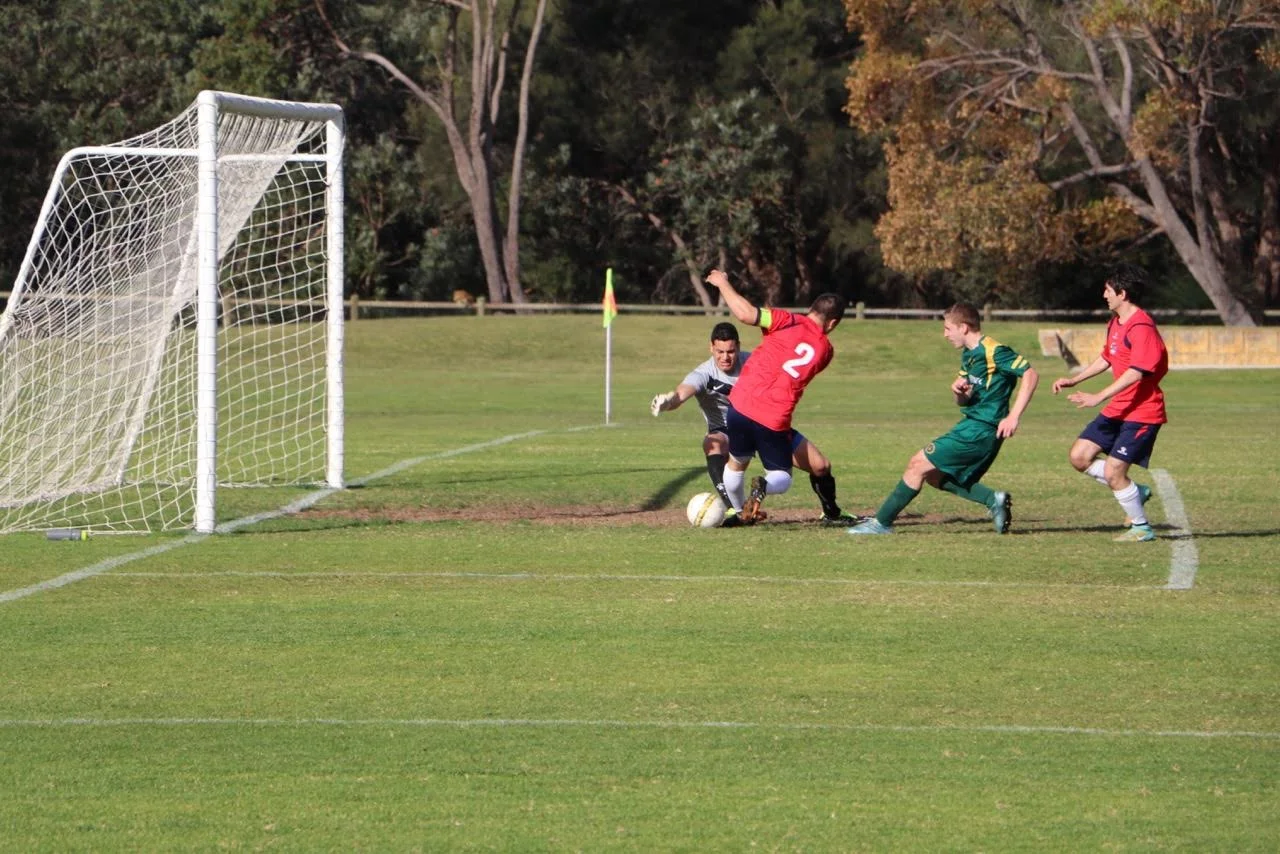 Alex Kretowicz scores the opener for UWA from close range - Photo Courtesy of Gabriele Maluga