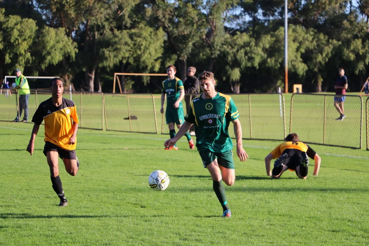 Geordie Papathanassiou on the ball for UWANFC - Photo Courtesy of Gabriele Maluga 