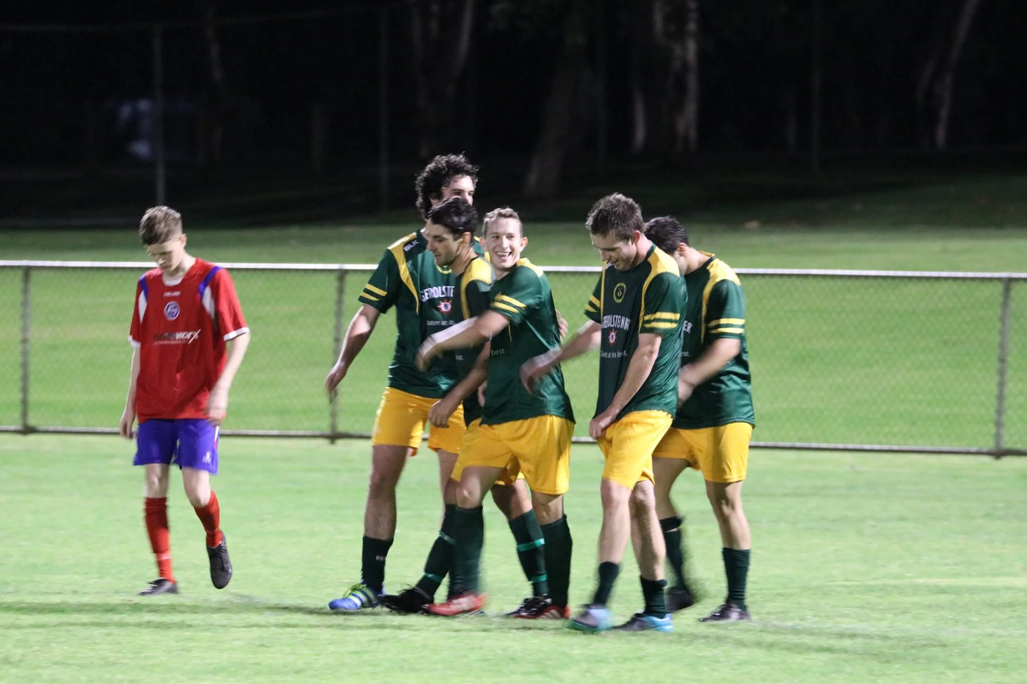LLOYD PROUT CELEBRATES ONE OF HIS THREE GOALS AGAINST QUINNS IN THE NIGHT SERIES