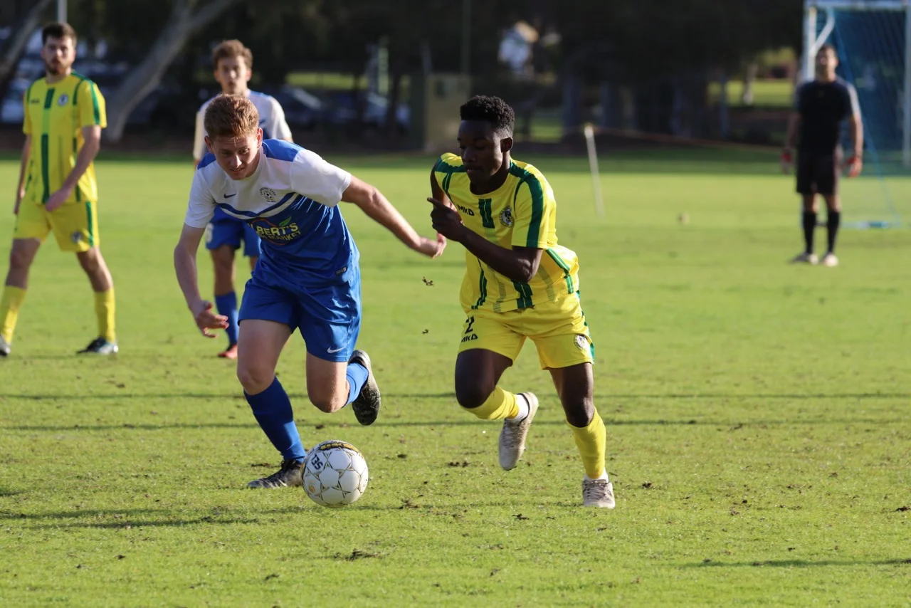mORDECAI JUNIOR EVADES A DEFENDER IN THE SECOND HALF - CREDIT: GABRIELE MALUGA