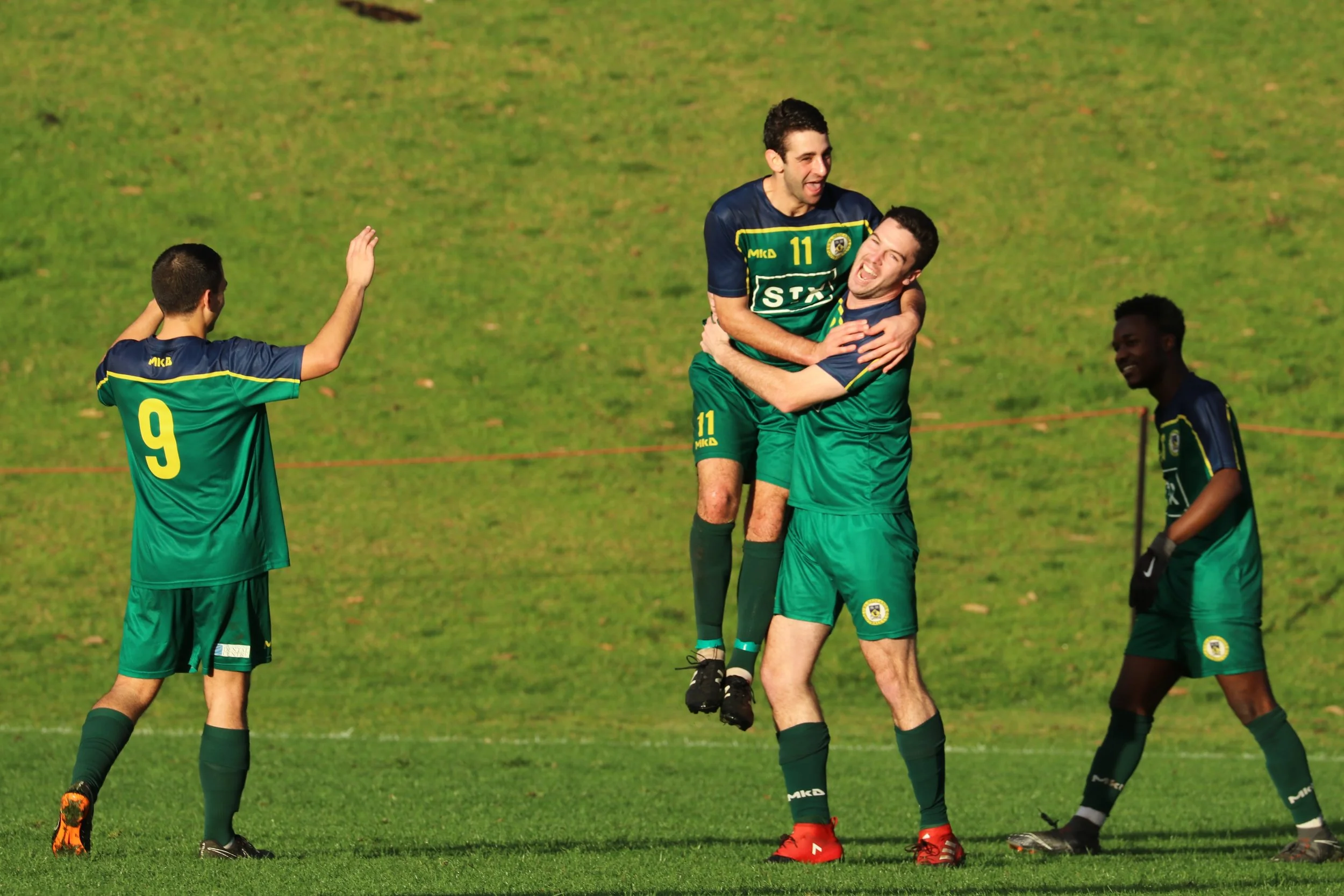 THE BOYS CELEBRATE MORRISON'S LATE GOAL - CREDIT: GABRIELE MALUGA