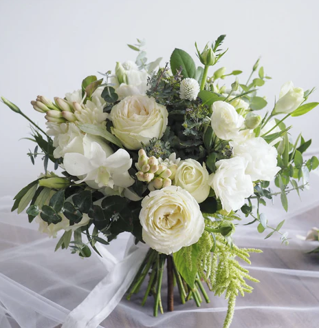 Seasonal floral bouquet wedding.png