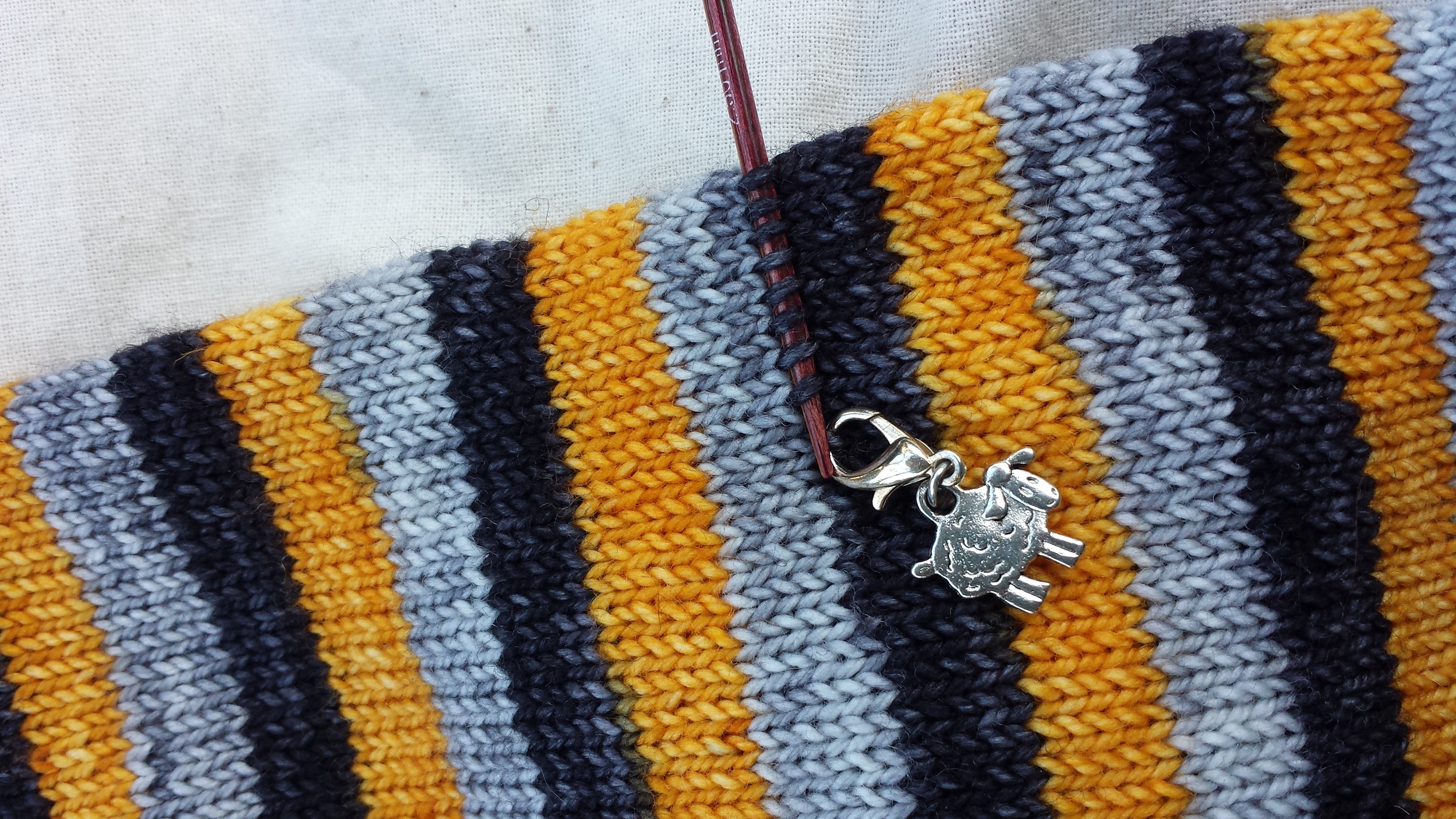 Start to pick up stitches for one side of the heel.