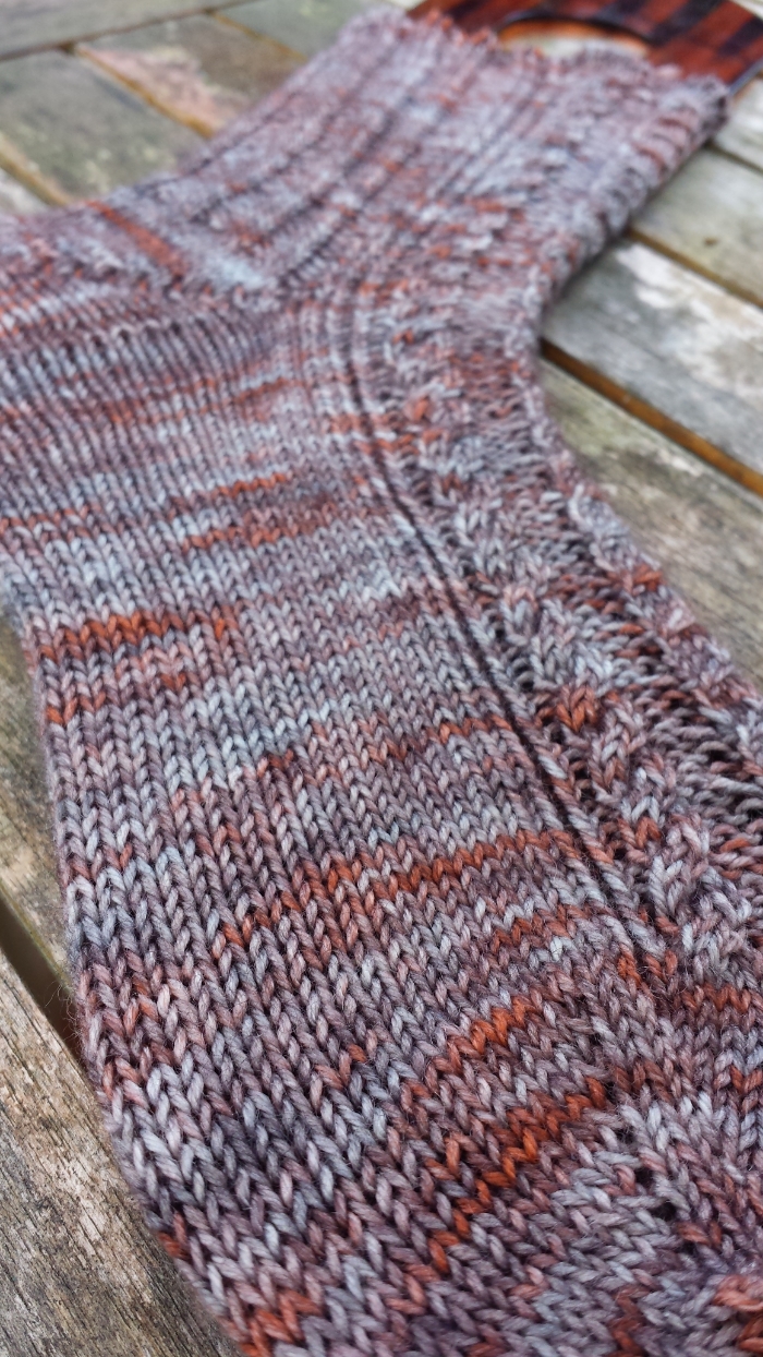 Malala Socks pattern in Rusty Ferret, Doll yarn. Colourway: The Dark Below