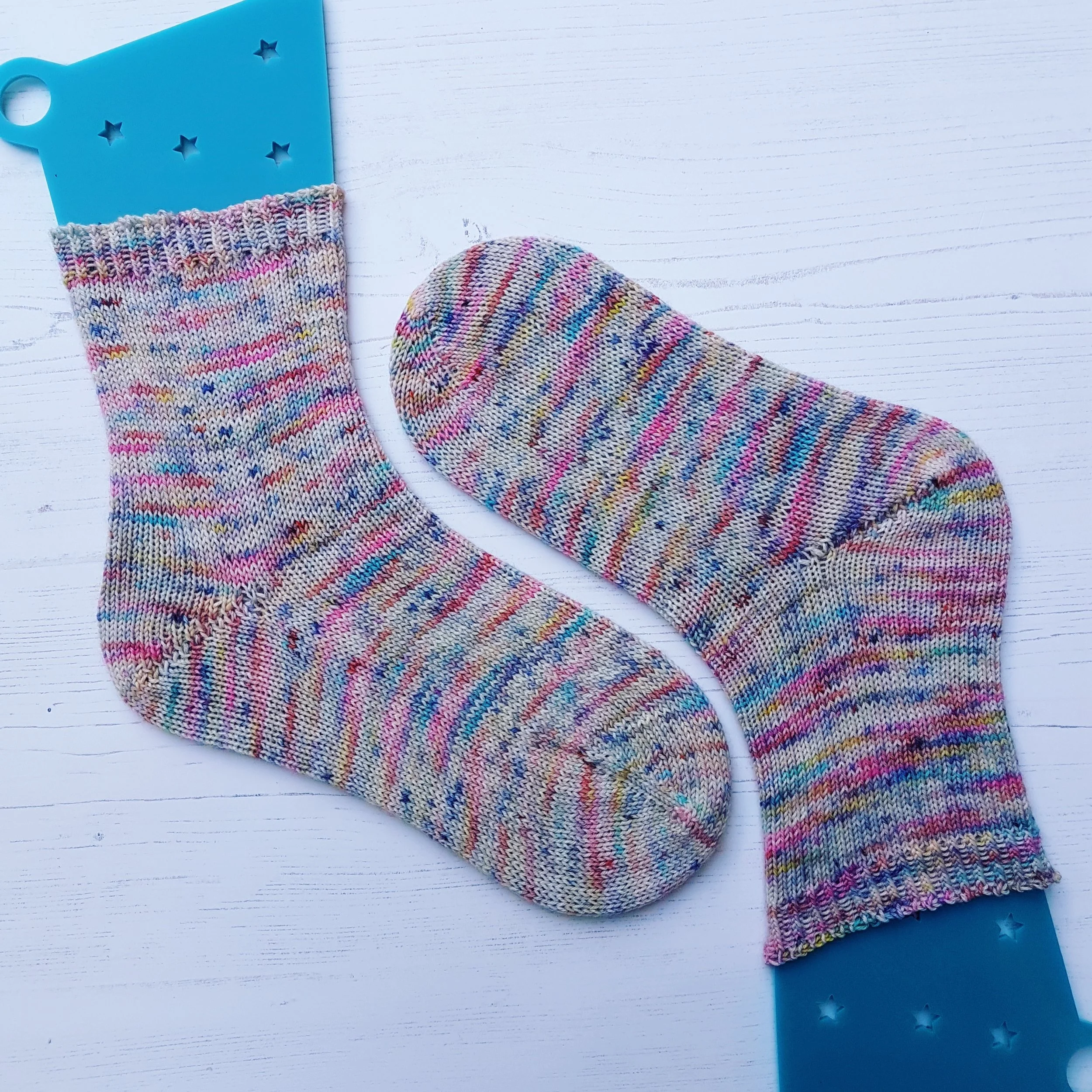 Toe-up socks in yarn from West Green Loft Yarns 