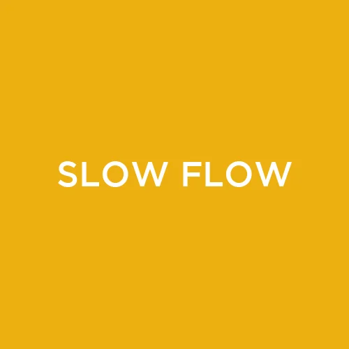 Soulful and candlelit, Slow Flow classes integrate the composition of strong yoga poses with the gentle ease of flowing movement. Slow Flow is inspired by Vinyasa but encourages individualized, creative and mindful movement through ambitious but playful sequencing. Moving at a reduced, deliberate pace means practitioners are challenged to fully engage mentally and physically while holding poses for longer periods of time. Poses and transitions are linked fluidly with the breath and emphasis is placed on moving gradually, gracefully and purposefully to develop strength of body and mind. Open to all levels.