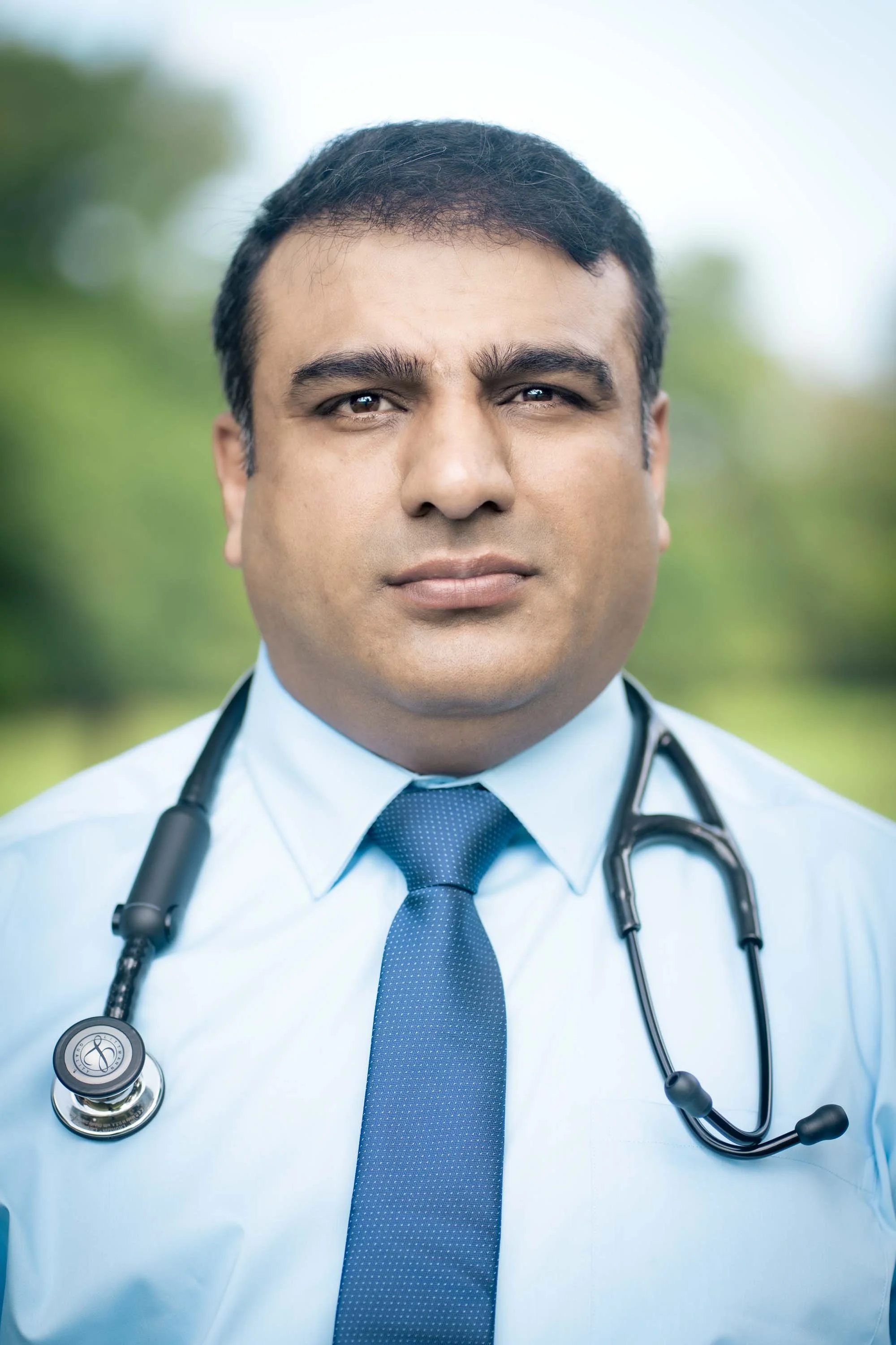 Raja Hussain, MD