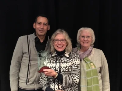 Petoskey Garden Club, William Santos, Sandy Selden and Shirley Burns receiving the Beautification Award at the 2016 Breakfast for Champions.