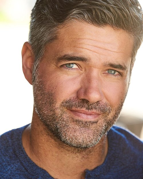Jeremy John Wells as DEAN
