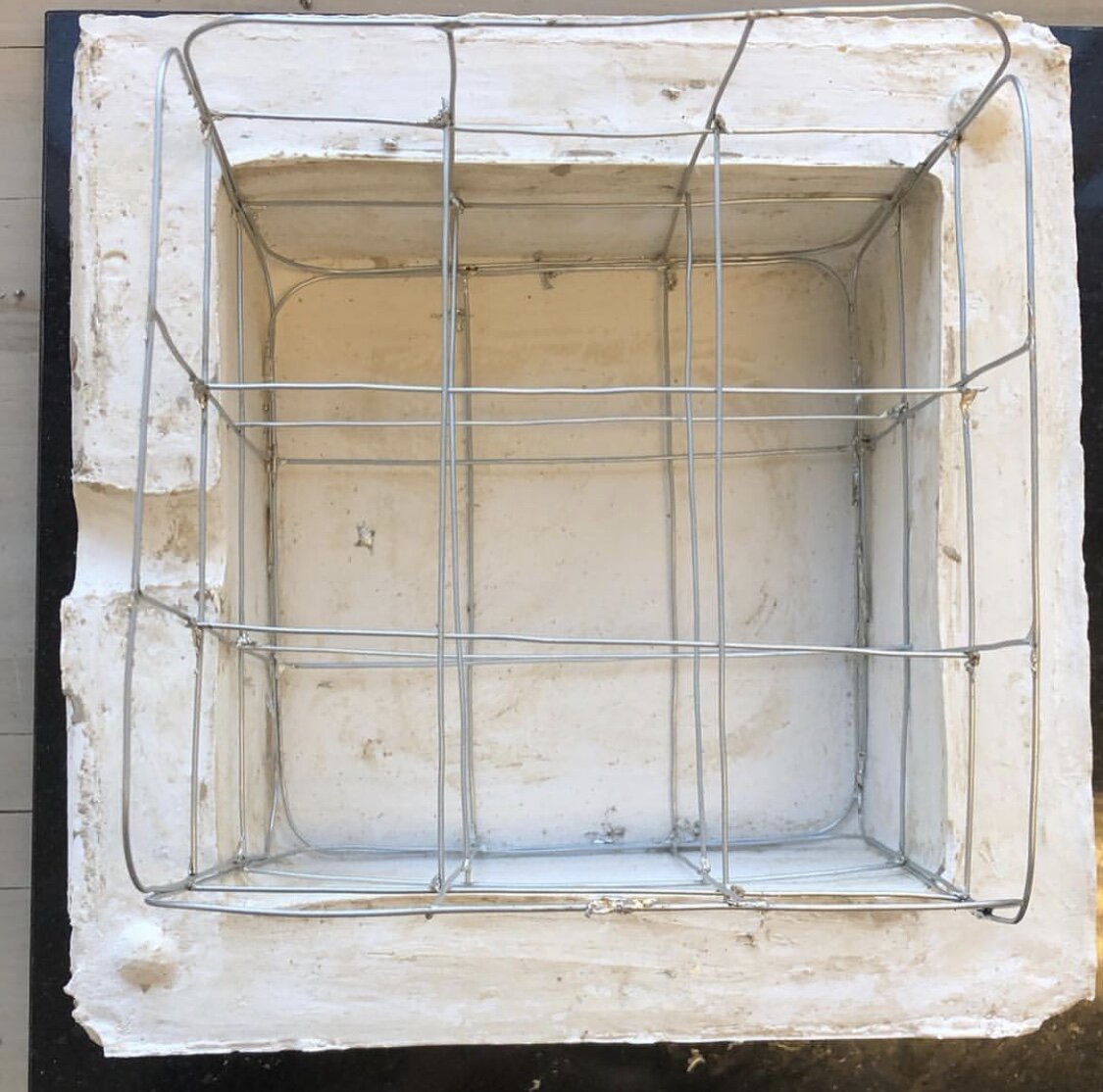 The steel grid inside the mold