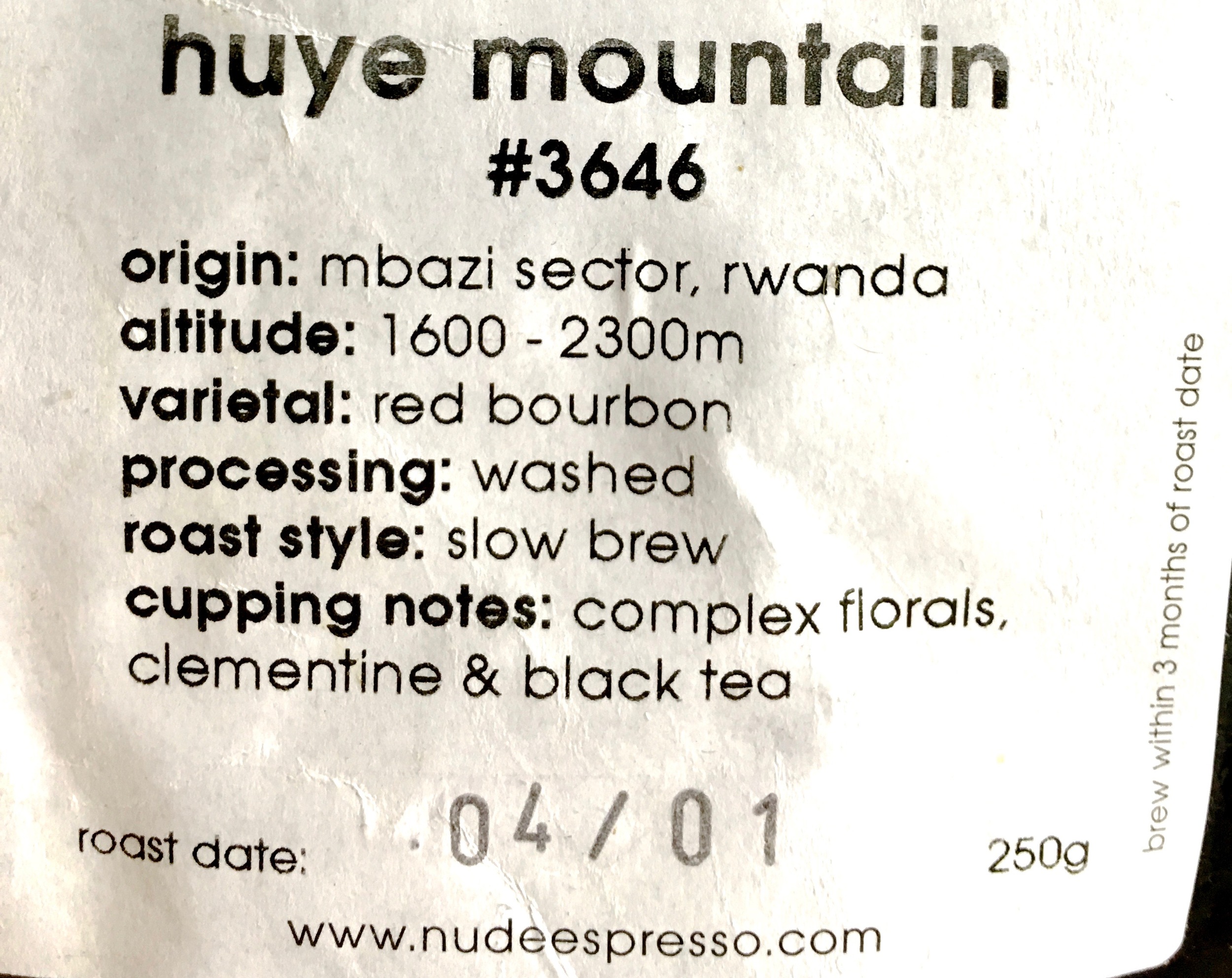 The label from a bag of speciality coffee. Notice the lot number at the top, specific region, varietal and tasting notes.
