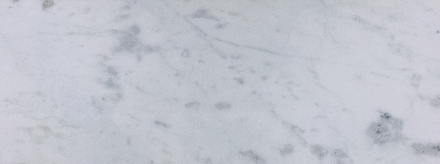 WHITE CARRARA FROM ITALY - MEDIUM-WIDE VARIATION AND SHADE. THE BEAUTY OF NATURAL STONE IS THAT EACH PIECE IS DIFFERENT AND UNIQUE. THE PICTURE IS A REPRESENTATION OF THE CHARACTER OF THE STONE'S VEINING AND COLOR ONLY. 
