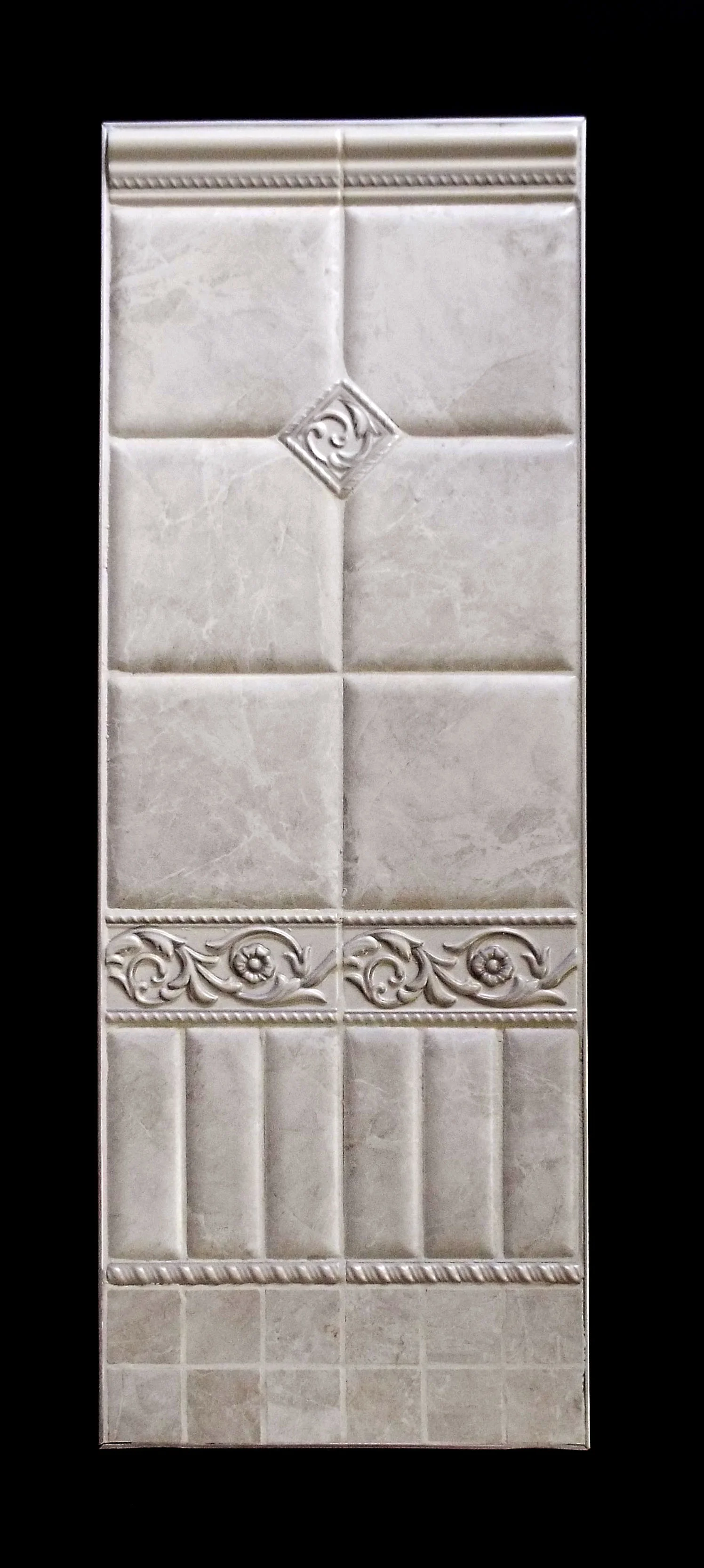 GRIGIO 2"X6" TORELLO ESTE, SHINY - 12 PC/CTN 6"X6" MATTE, Pillowed Edge - 38 PC/CTN (9.2 SF) 2.4"X2.4" TOZETTO ESTE, SHINY - 10 PC/CTN (2 different design randomly picked.) 3"X6" LISTELLO ESTE, SHINY - 18 PC/CTN. 2"X6" MATTE, Pillowed Edge - 114 PC/CTN (9.2 SF) 0.6"X6" MATITA ESTE, SHINY - 14 PC/CTN 2"X2" MOSAIC - 11 SHT/CTN ALSO AVAILABLE - 0.4"X6" COPRIFILO, SHINY - 6PC/CTN (Used to finish the tile.)
