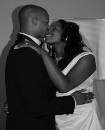 This is a photograph from my own wedding, notice the blinds and poor picture resolution. This would have never happened had I hired an experienced professional photographer.