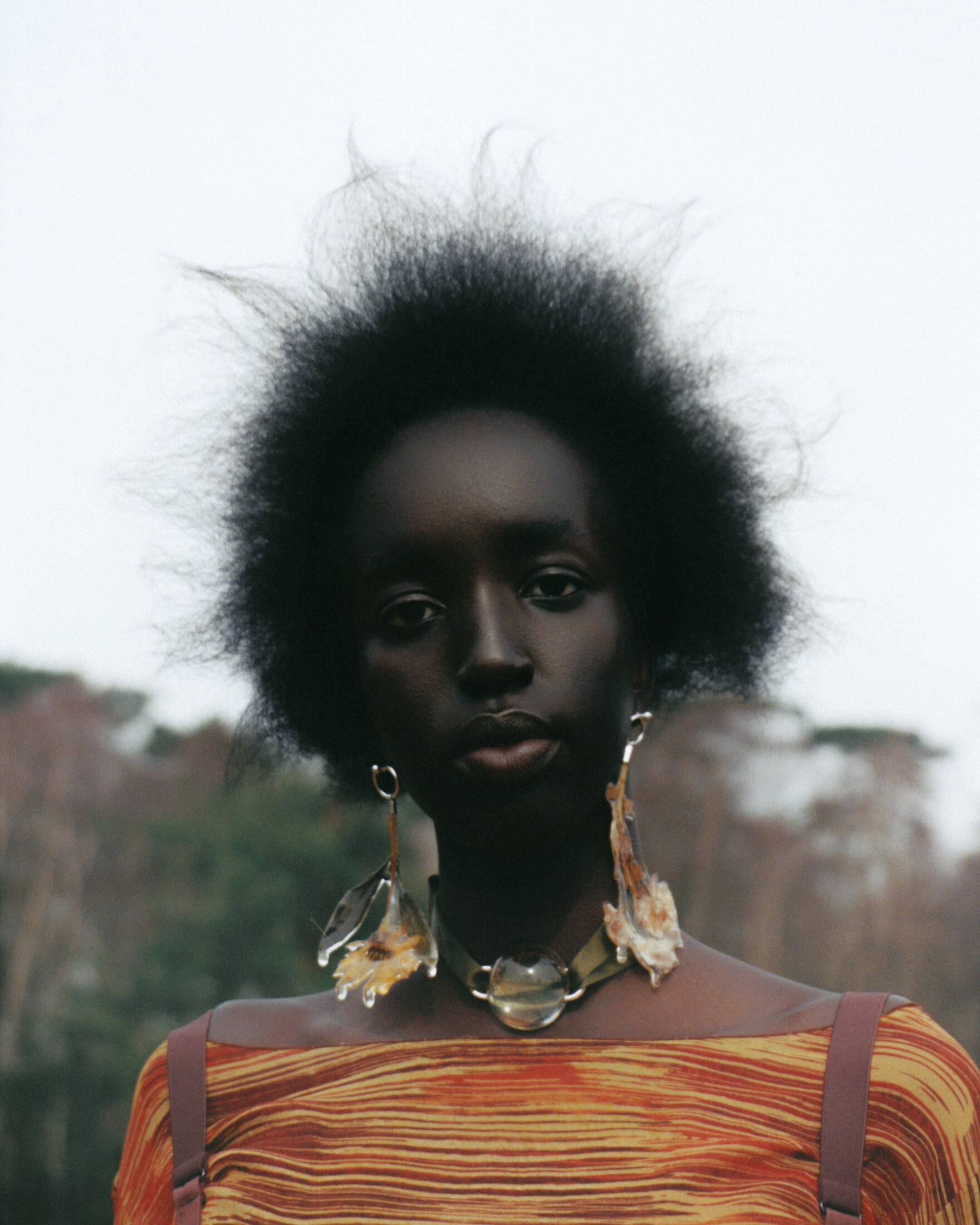  Dazed China, June 2021  Nyaueth Riam Wears Pressed Flower Earrings   Photography Grant James Thomas  Styling Lola Chatterton   Hair Ryuta Saiga  Make up Michelle Boggs   Nails Michelle Class   