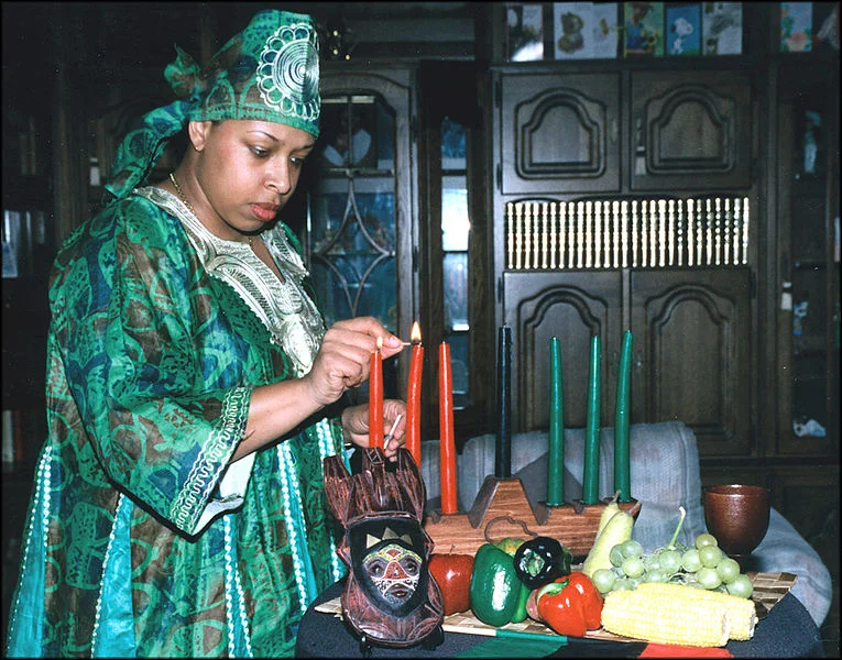 U.S. Tech. Sgt. Jennifer Myers (above), 66th Air Base celebrates Kwanzaa (2006)- photo by Christopher Myers