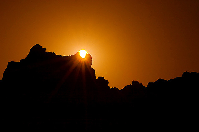 View of the setting sun passing through the notch of the prehistoric Observatory Kokino, Republic of Macedonia