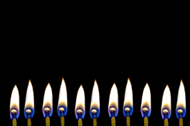 When the puritans made christmas illegal, the christians put candles in their windows to signal priests that it was safe to come to their homes to celebrate the holy days