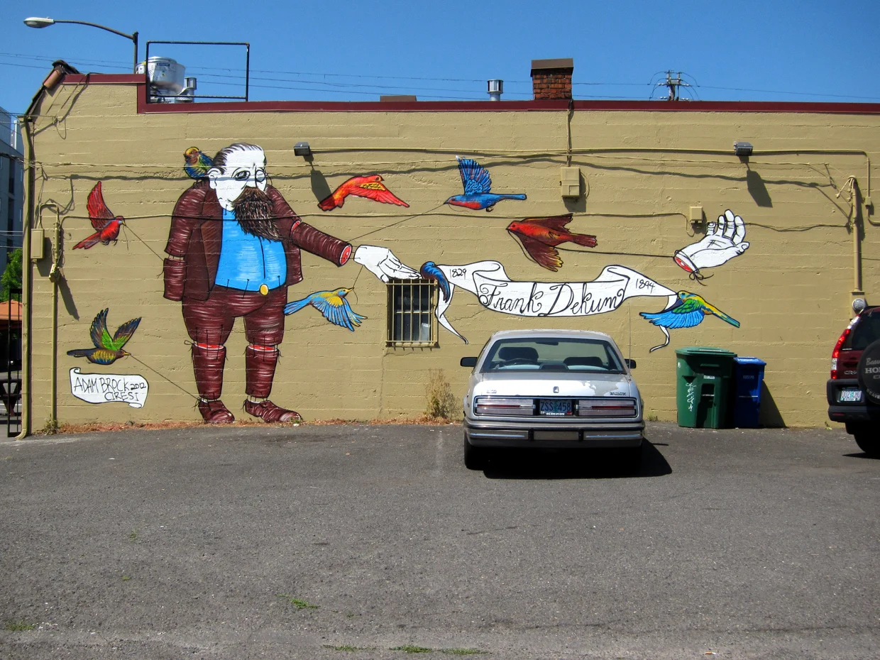 The Tale of Frank Dekum. Dekum and MLK. Spray paint. 18' x 35'. 2012
