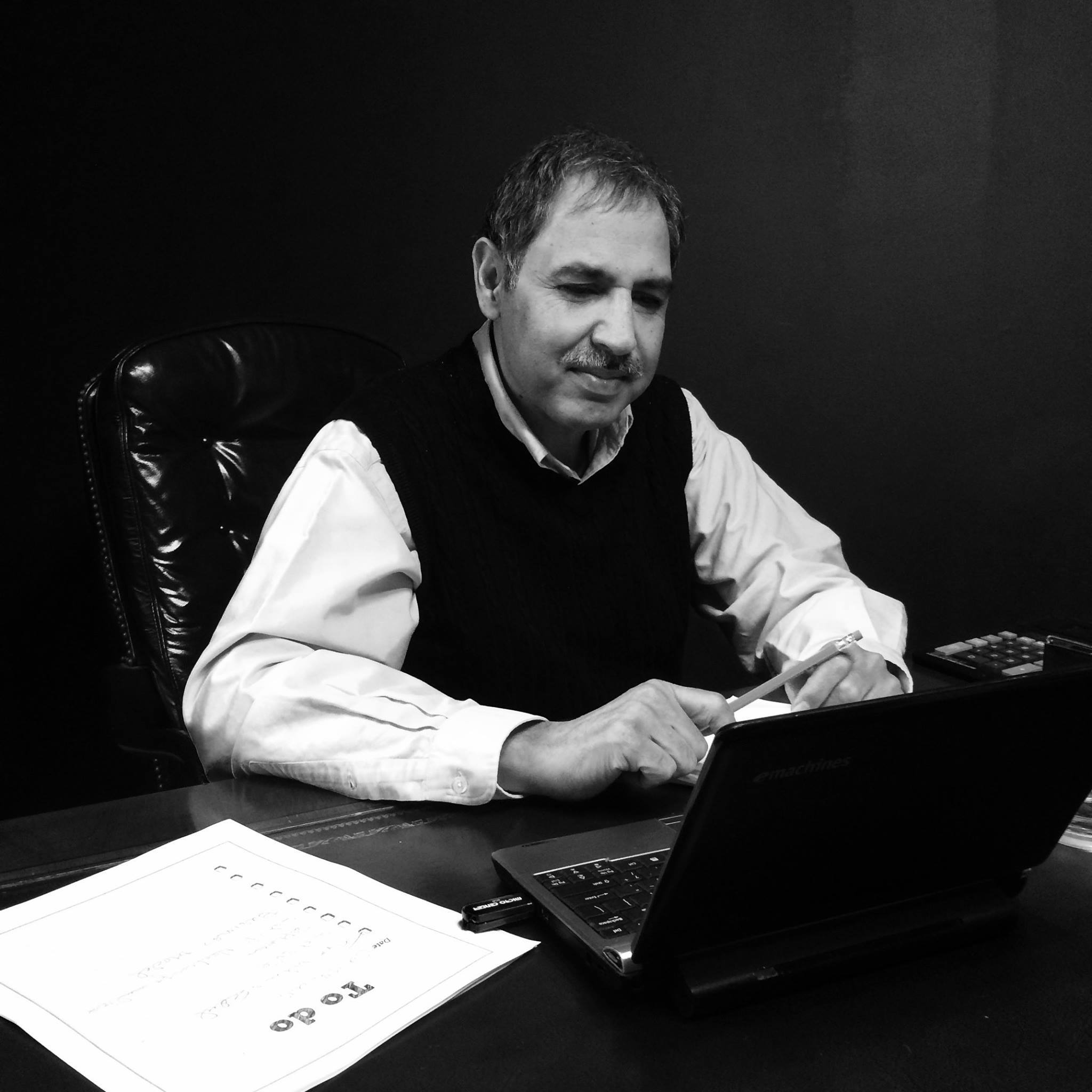 My father at his desk. 