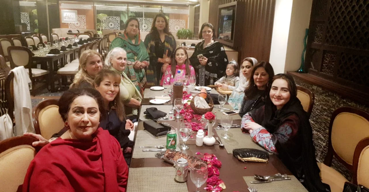 In America, only 1 in 3 Muslim women embrace a headscarf. In Pakistan, headscarves are often adorn upon the shoulder, and drawn over the head when a woman feels particularly unsafe or immodest. This photo of women having lunch in Lahore, Pakistan features few who felt that way.
