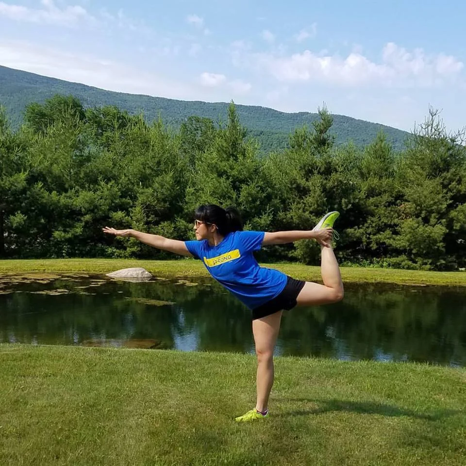 This is not me at an official wellness class but I'm including it because OMG that view and OMG my back finally felt good enough to do this pose. (I'm giving Vermont credit for both things.)