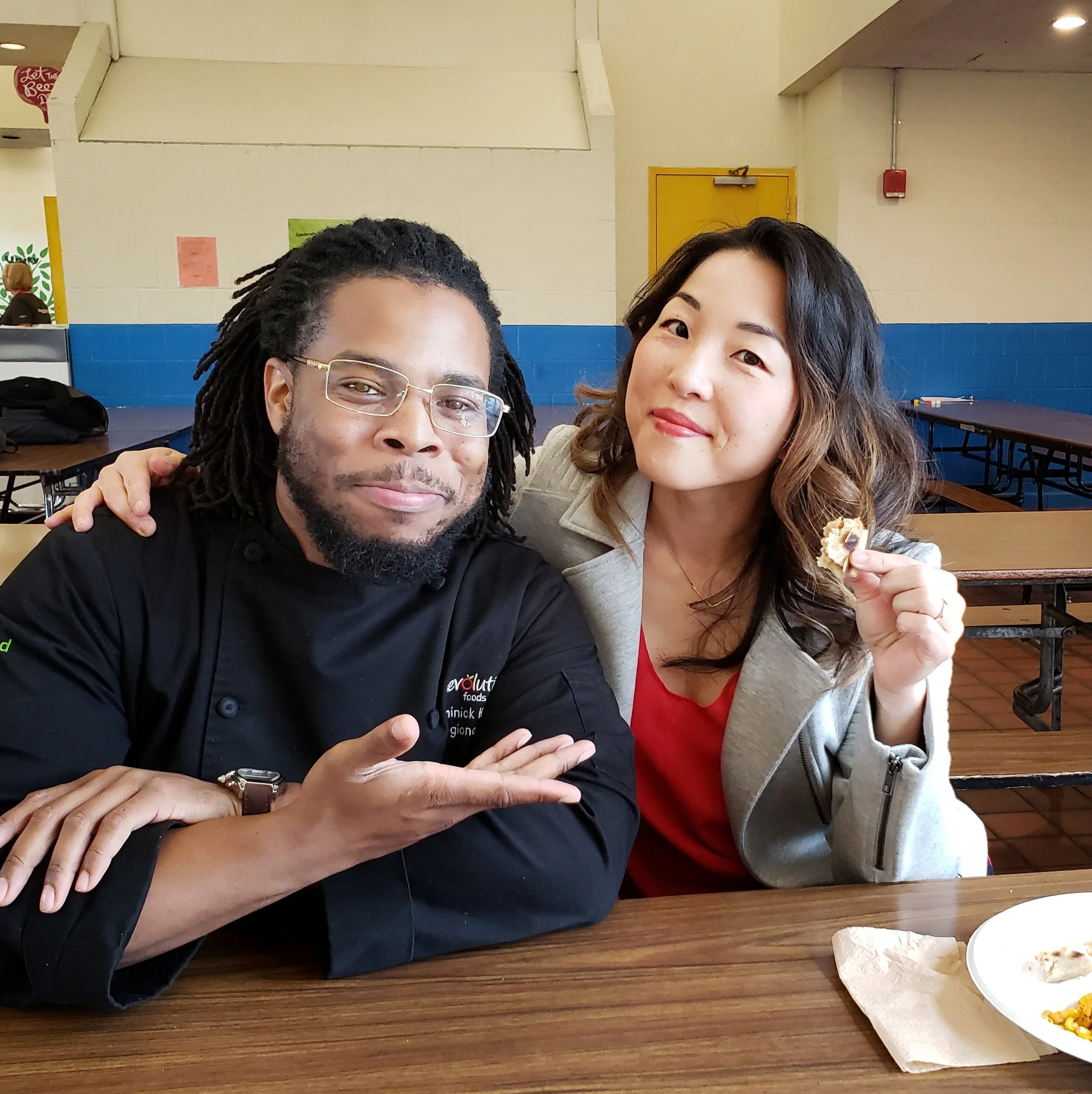 With the amazing Revolution Foods Regional Chef Dominick Hayman (and my last bite of pupusa)!