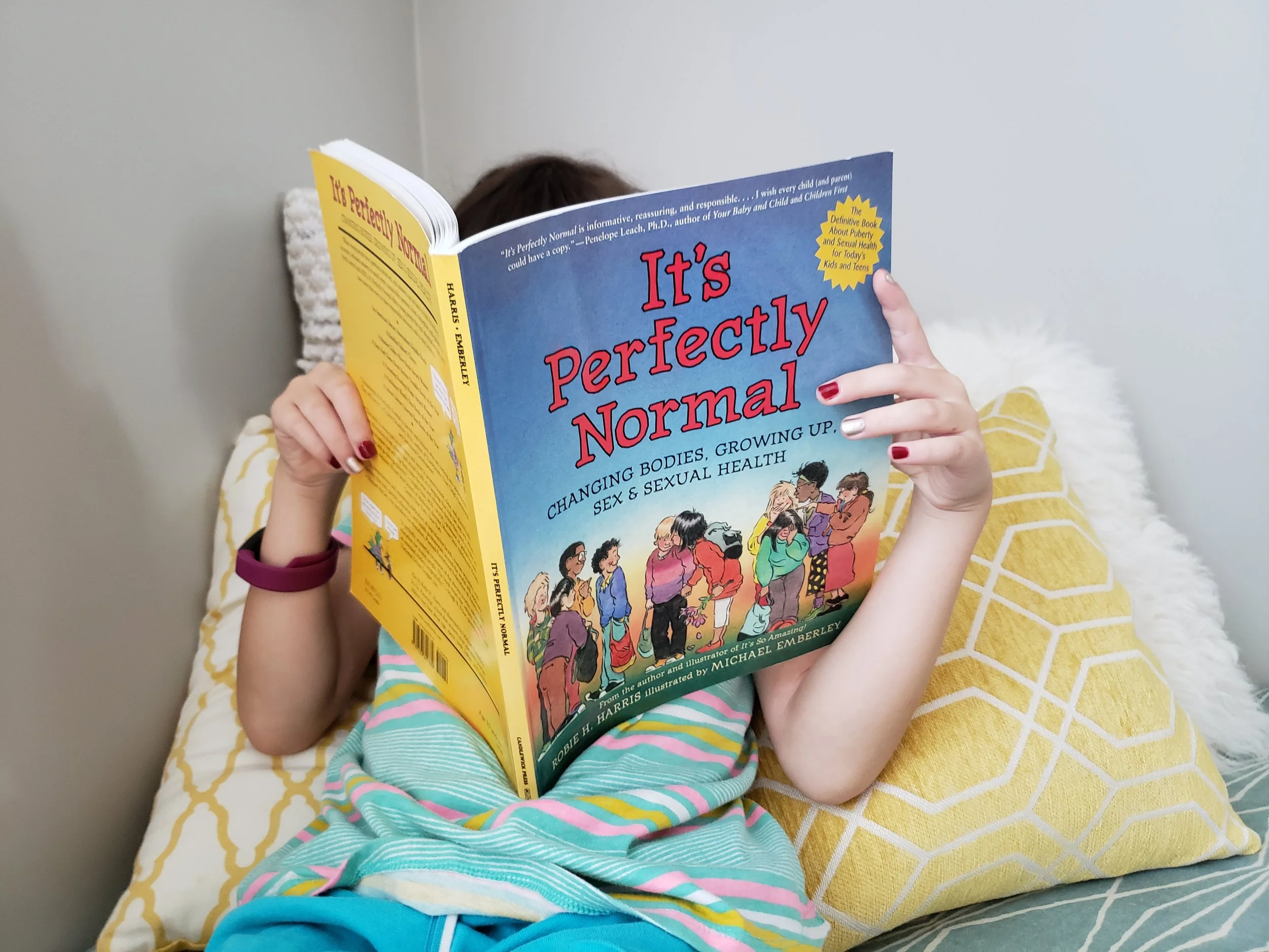 Violet is only 8 but she is super into “It’s Perfectly Normal” by Robie Harris