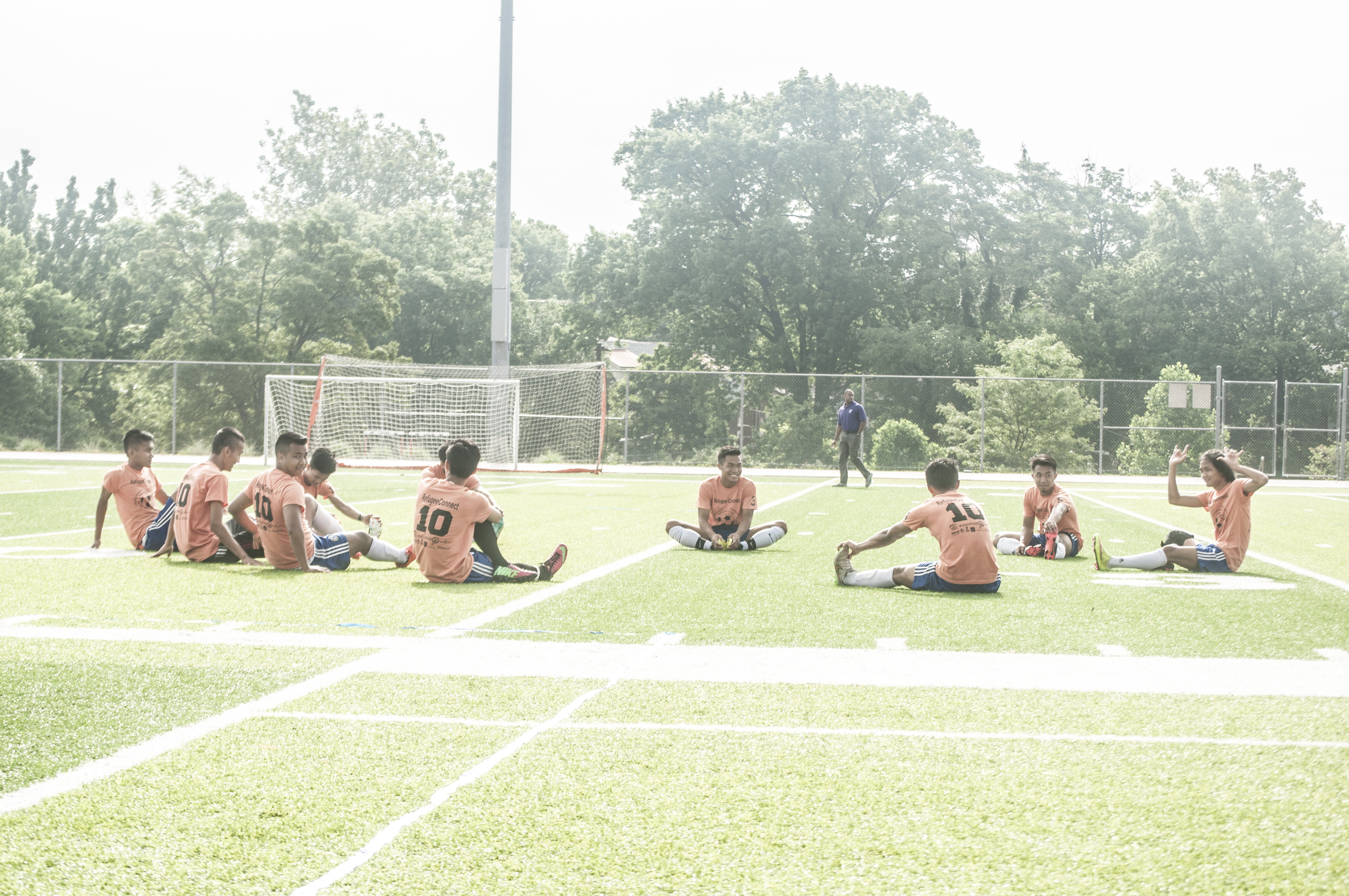The Myanmar team stretched out before the game started.