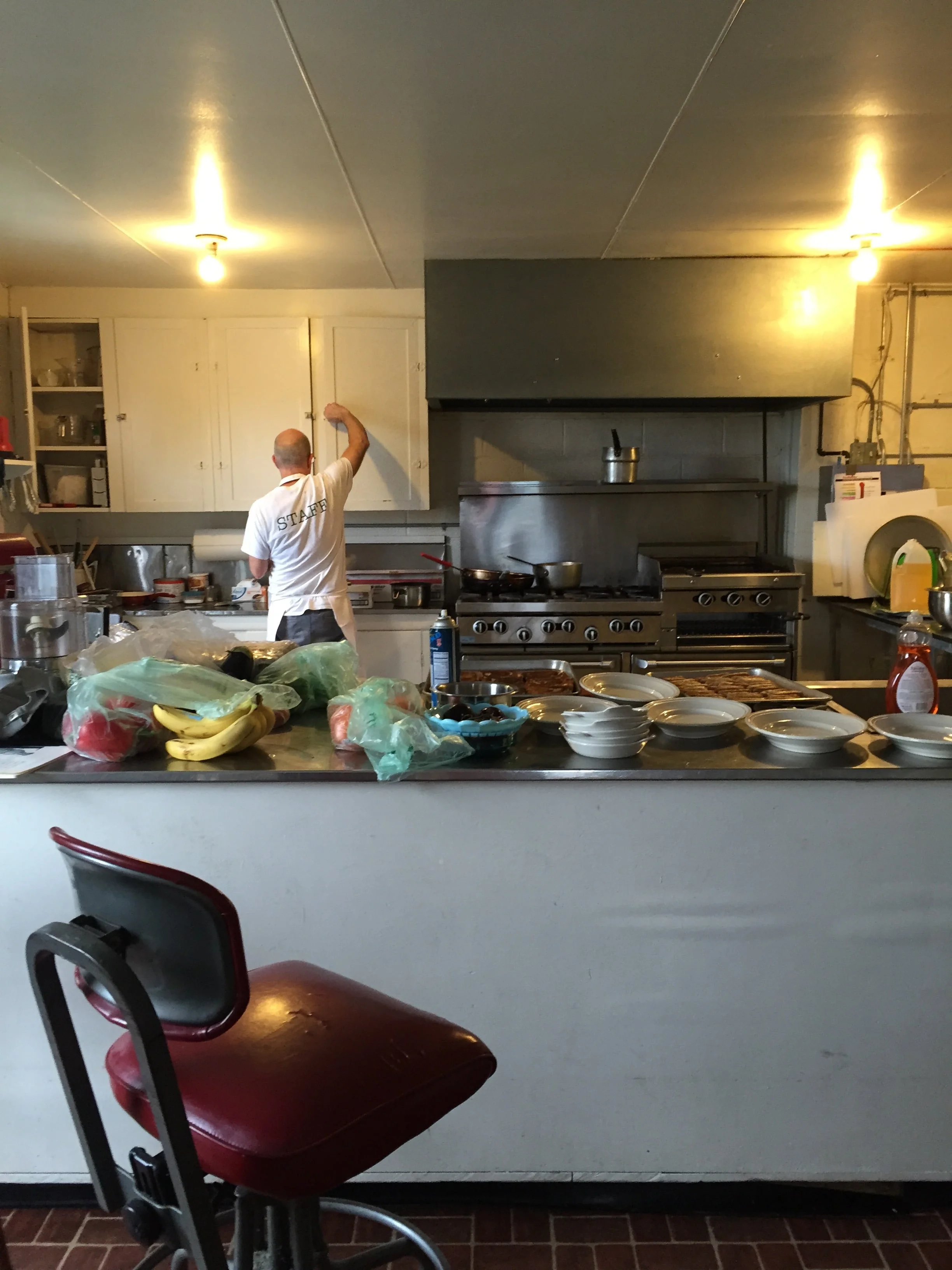 Jim Stewart making it all happen. Delicious, healthy, food!