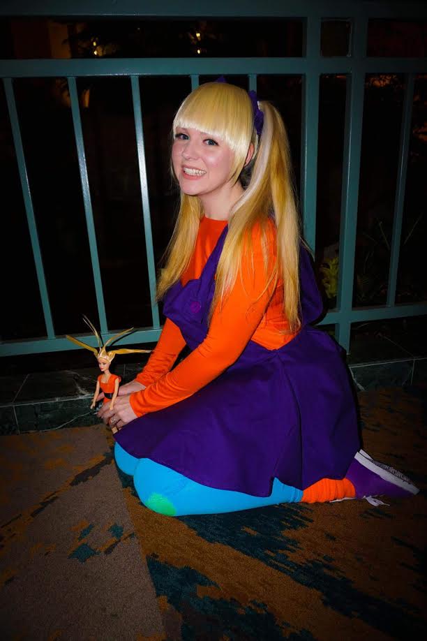 Angelica Pickles- Rugrats I DON'T WANNA DO THIS I WANNA EAT COOKIES!!! Oh, sorry...She is VERY easy to get into character with! Angelica was my "I'm a 90's kid" cosplay and was a VERY easy choice. Not only did I make her 100% (the leggings and shoes were painted by me and the socks were from when I was in 5th grade!) but one of my Drag Queen Idols Phi Phi O'hara knew of me by this cosplay. Angelica is one of my shining stars of my cosplay closet! Especially since I get to eat cookies the whole con and I've been known to stop places and lay on the ground to color. Seriously she's easy for me to play up! Photo by John Penta with C&C Media Designs: www.facebook.com/CCMEDIADESIGN1