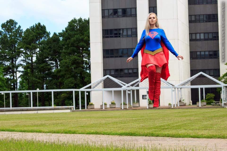 Supergirl-DC Comics 100% done by me. Used the simplicity body suit pattern (and heavily altered the booty portion), made a circle skirt, free handed the cape pattern (I was being risky), and made the belt out of foam. She always needs some sort of TLC because she is my most worn cosplay. She is the one I take to the children's hospital for visits. Honestly her personality matches mine the most. When I wear her I am ALWAYS surrounded by awe struck kids, which makes me feel...well...Super! Photo by Josh Thompson of Josh Thompson Photography: www.facebook.com/joshthompsonphoto