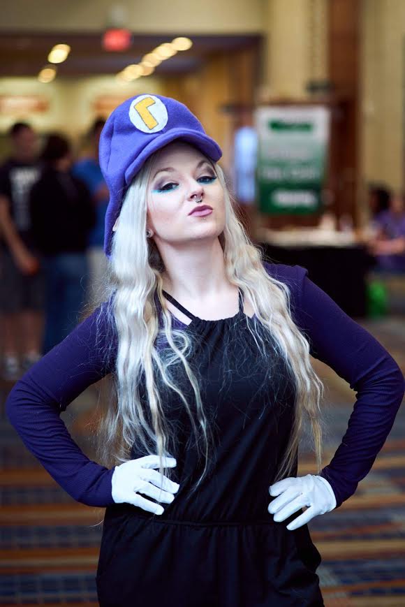 Waluigi- Mario Everything was found and put together for Super Smash Con, Minus the hat. The hat was made with felt and the L is hand painted on. What you can't see is my septum ring is the TINIEST mustache in the entire world. Photo by www.facebook.com/owlbearmedia