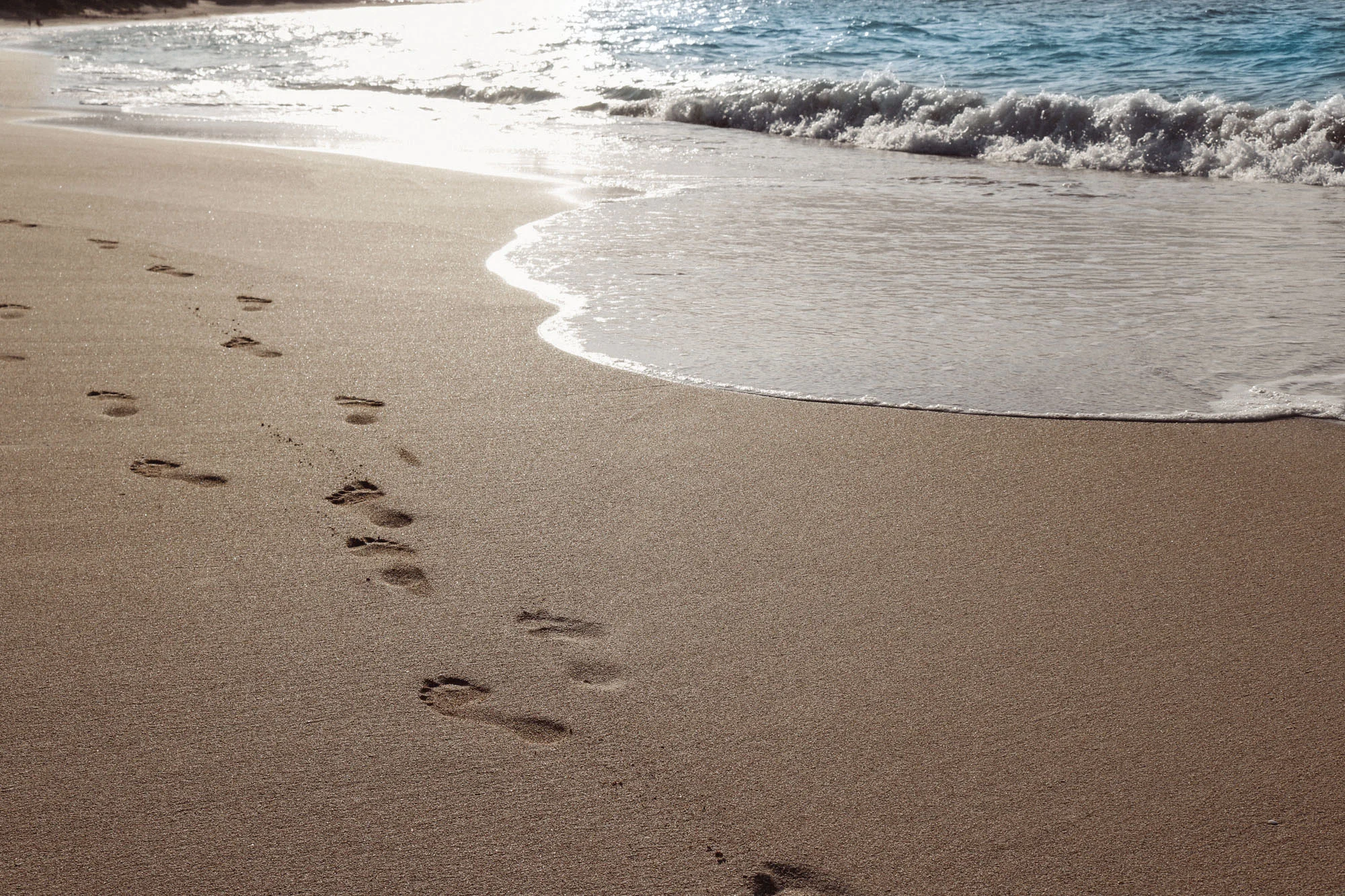 footprints-beach-ocean.jpg
