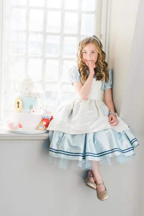 How cute is this ‘Alice in Wonderland’ style dress by Little Bevan? Photograph by Kate Nielen Photography.