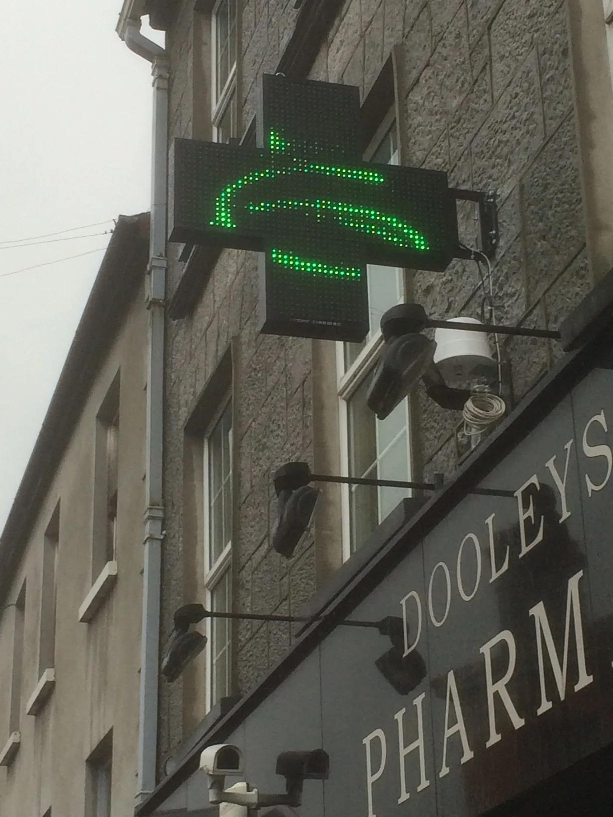 LED Sign Solutions Install Pharmacy Cross at Dooleys Pharmacy