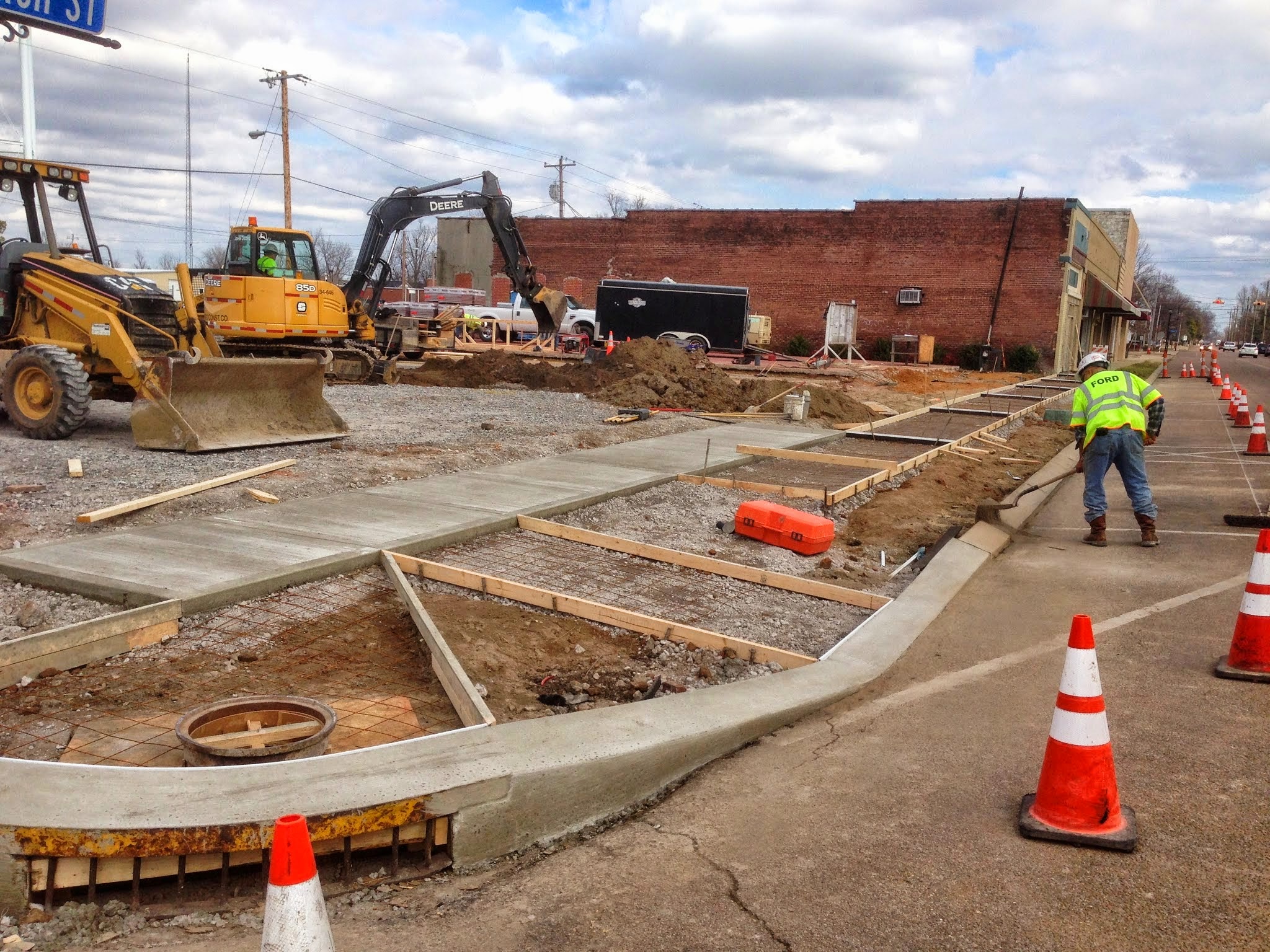 Tiptonvill e, TN streetscap e rehabilita tion. Completed in May, 2013. Provided ADA crossing design and administra tion/permi tting through TDOT. Design Limitations: Per TDOT's requirements, we were unable to alter or disturb the existin