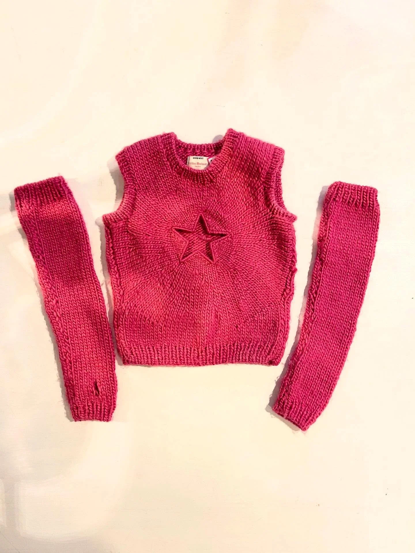 One amazing 3-piece styled four different ways! The star of the show is a handknit Lirika Matoshi sweater with matching arm warmers. This surprisingly versatile and multi season piece might be your next closet staple!

#consignment #vintage #fashionb