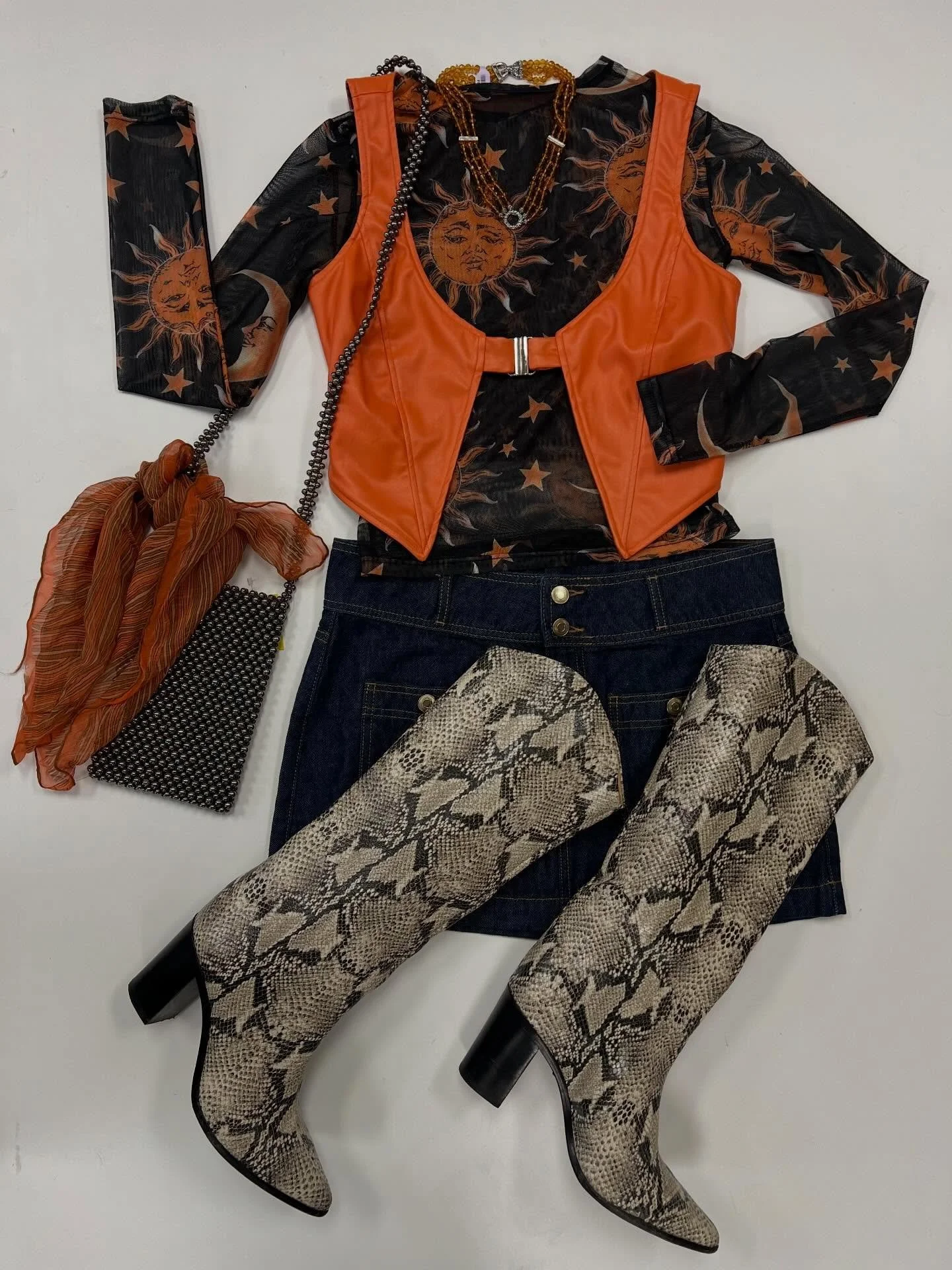 We&rsquo;re bursting for sun and warmer weather but will settle for knee high boots &amp; mesh layering tops for now ✨🌞

Metallic beaded purse, $10
Orange and silver beaded necklace, $15
Silk &amp; nylon Japanese vintage handkerchief, $5
Orange plea