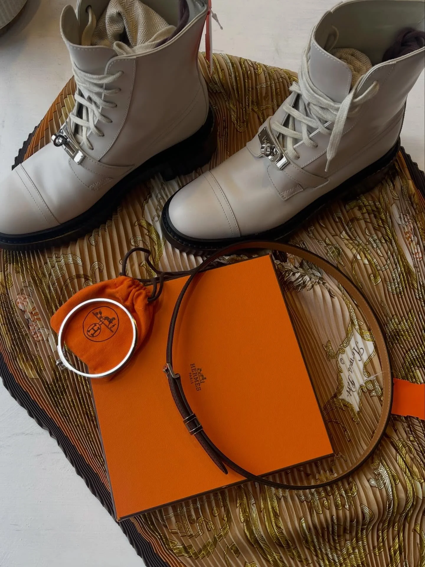 Hermes anyone? No leather appointment needed!

Pop H 15 belt, $850
Funk Kisslock combat boot, 36, $1200
Kelly Cadena H lock bangle, $480
Plisse Silk Cheval Turk, now $150