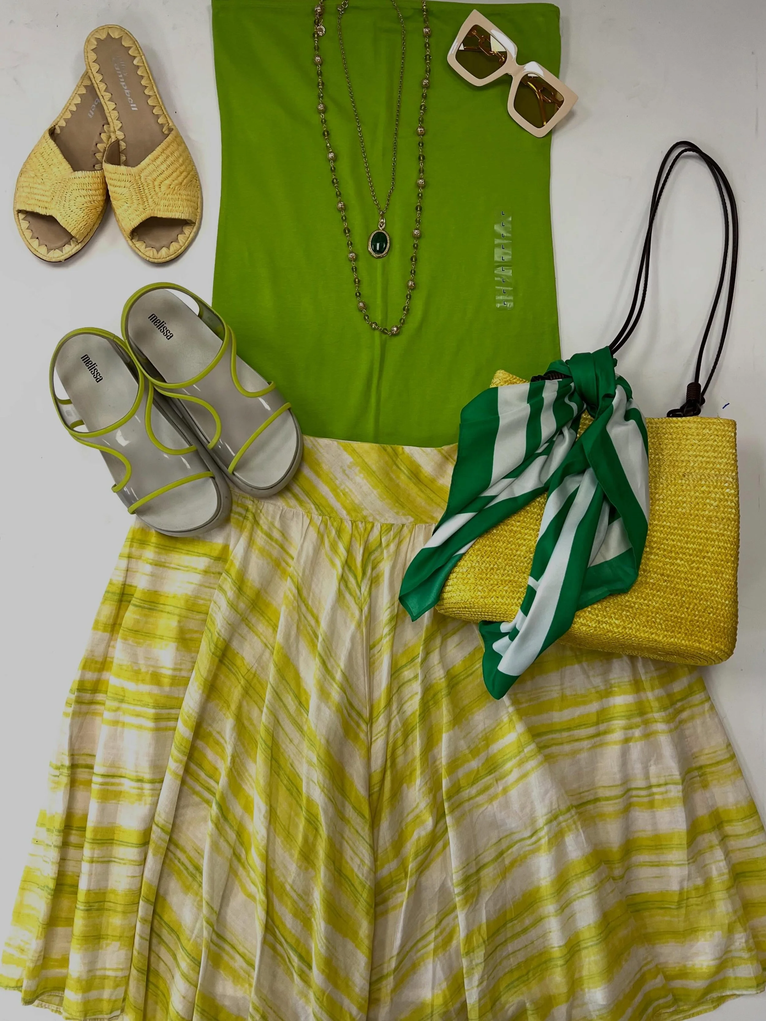It&rsquo;s time to come pick up that burst of color you&rsquo;ve been trying to find in your wardrobe!! 🍋🍋&zwj;🟩 Here from 11-6 today 🌟😉

Talbots Skirt - L, $16
Yellow Woven Bag - $10
City Streets Tube Top - L, $10 NWT
Beaded Necklace - $10
Meli
