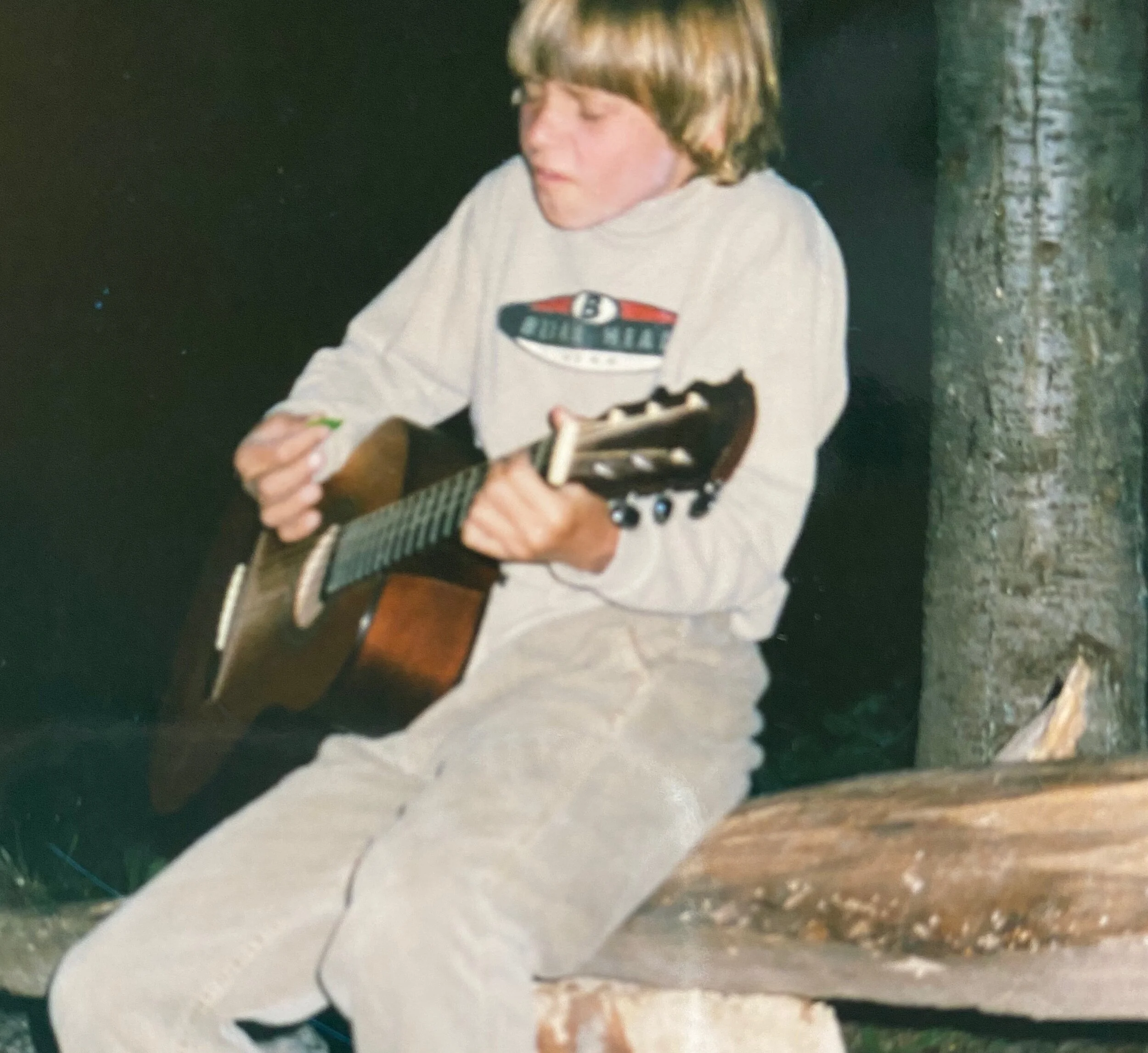 Baby Steven Play by the camp fire .jpeg