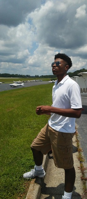 Channing Photo standing outside at Falcon Field.jpeg