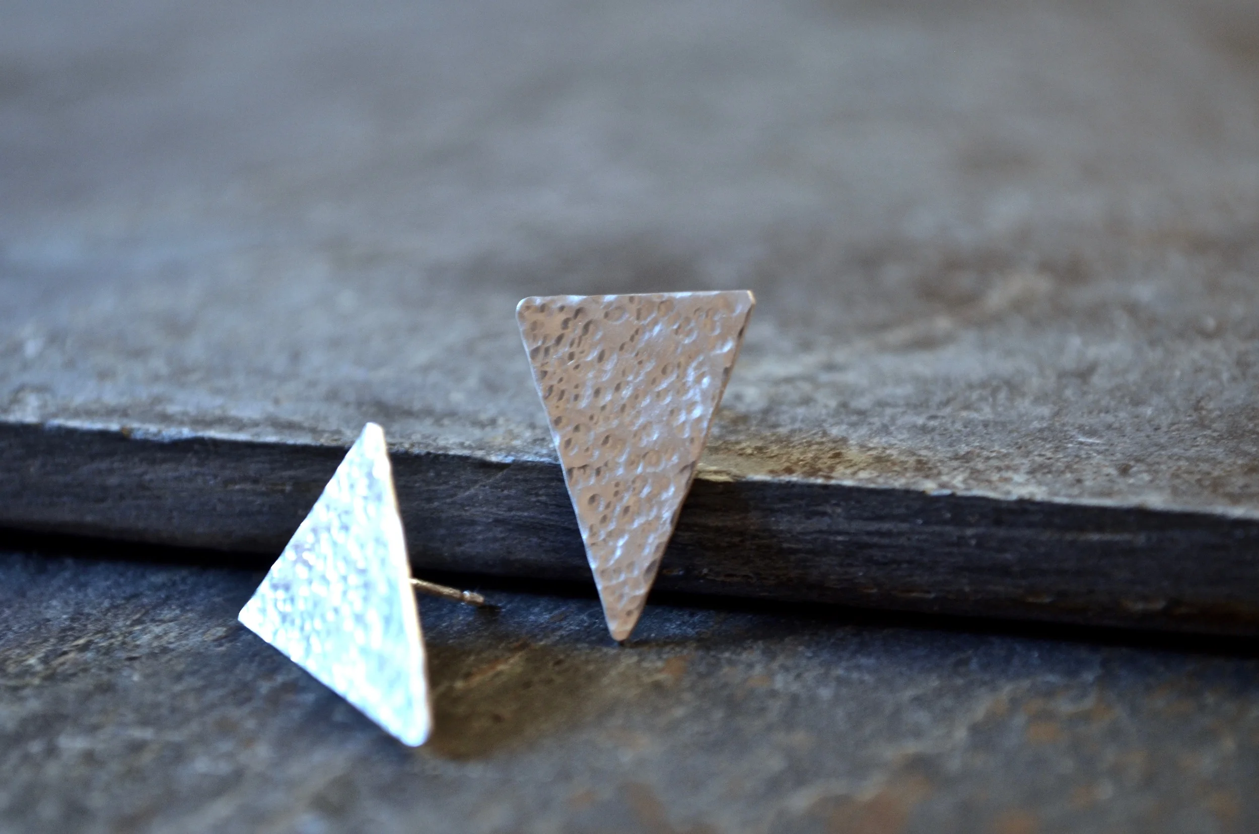 triangles of textured silver, with ear studs.